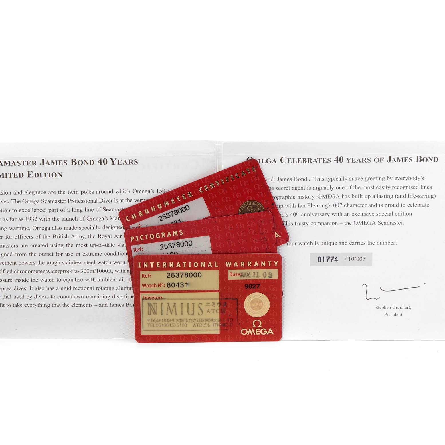 The image shows documentation and warranty cards for the Omega Seamaster 2537.80.00 Men's Stainless Steel Blue Dial 2537.80.00 Men's Stainless Steel Blue Dial James Bond 40 Years Limited Edition watch.