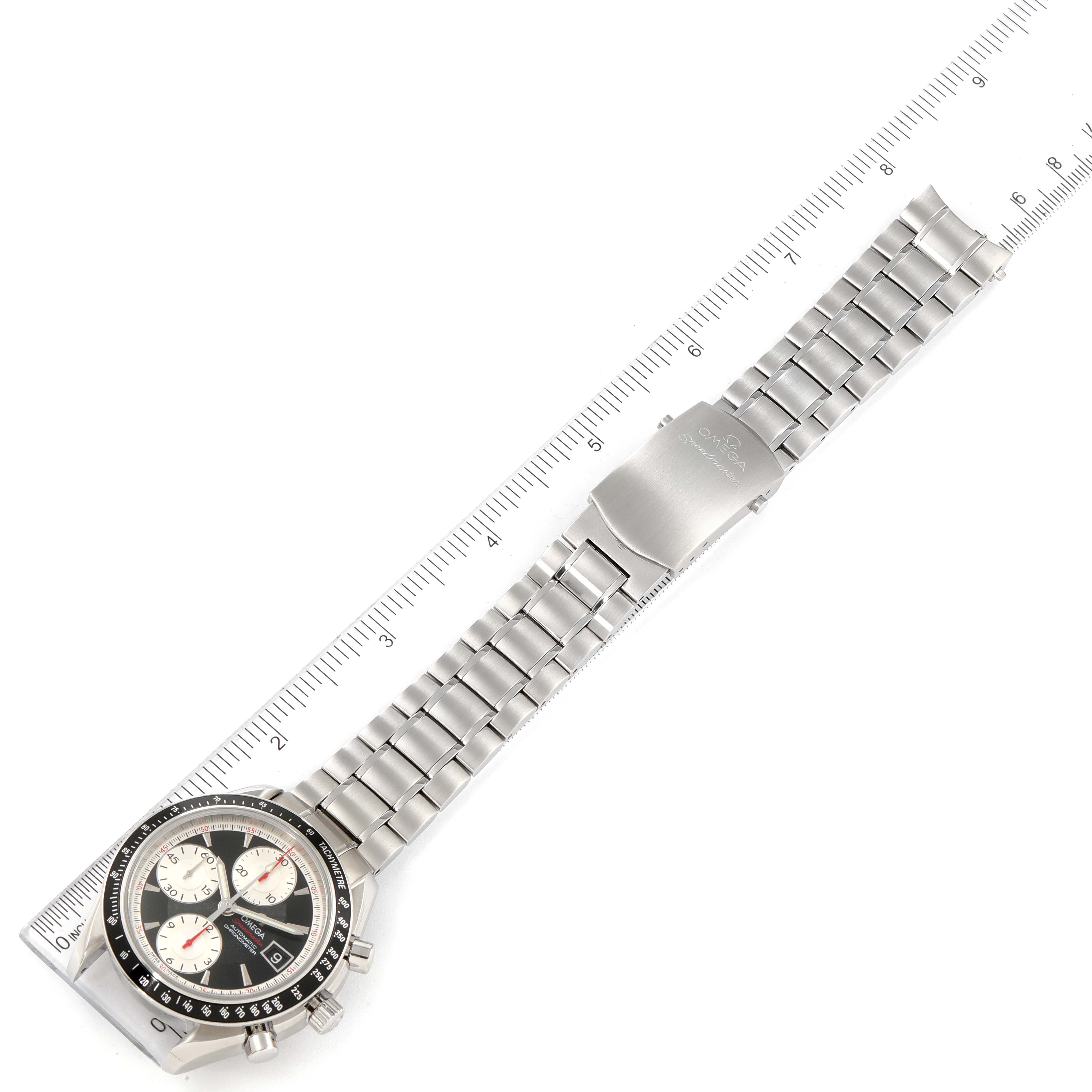 The image shows an Omega Speedmaster 3210.51.00 Men
s Stainless Steel Black Dial 3210.51.00 Men
s Stainless Steel Black Dial watch from a top-down angle, featuring the watch face, metal bracelet, and clasp.