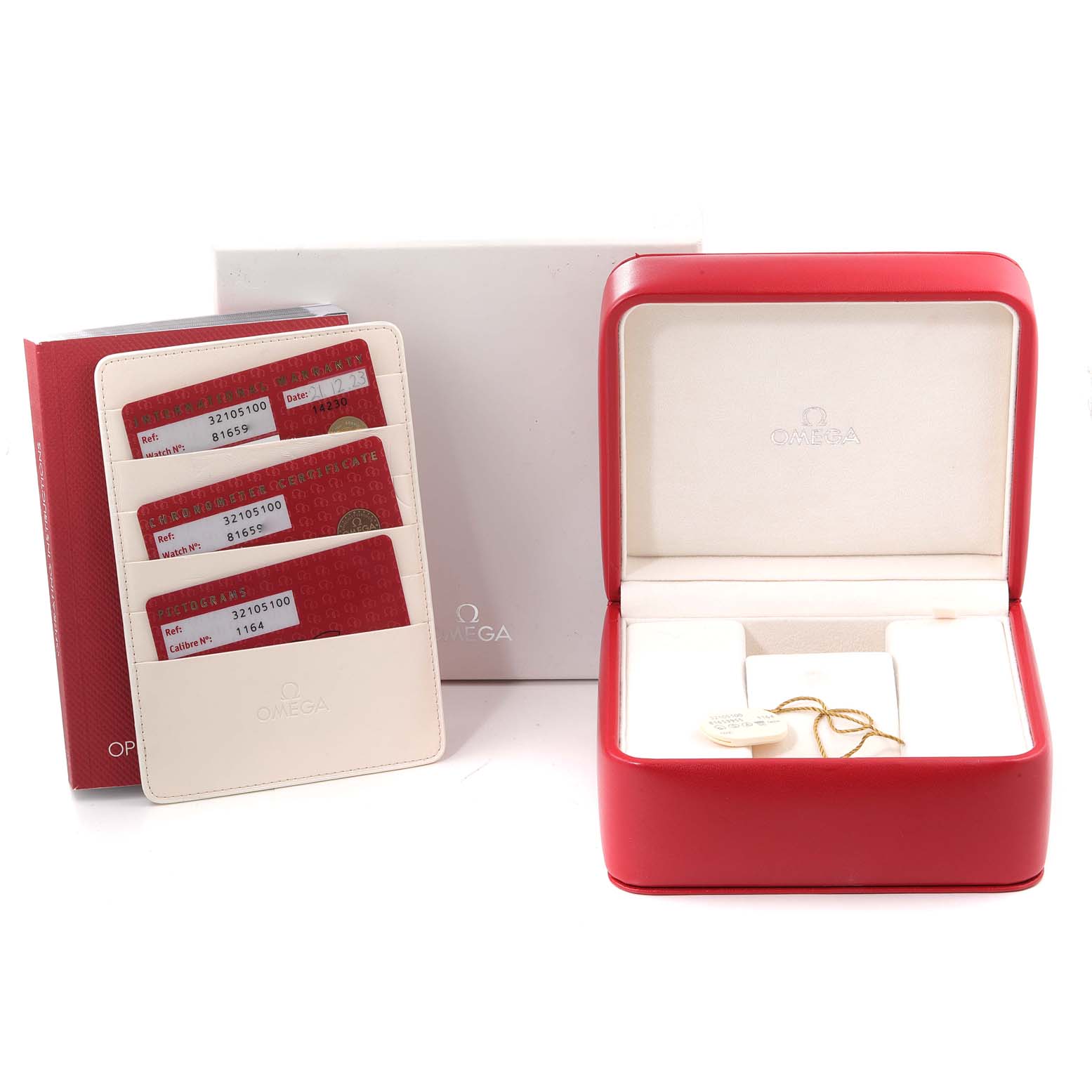 The image shows the open case and warranty cards for an Omega Speedmaster 3210.51.00 Men
s Stainless Steel Black Dial 3210.51.00 Men
s Stainless Steel Black Dial watch.