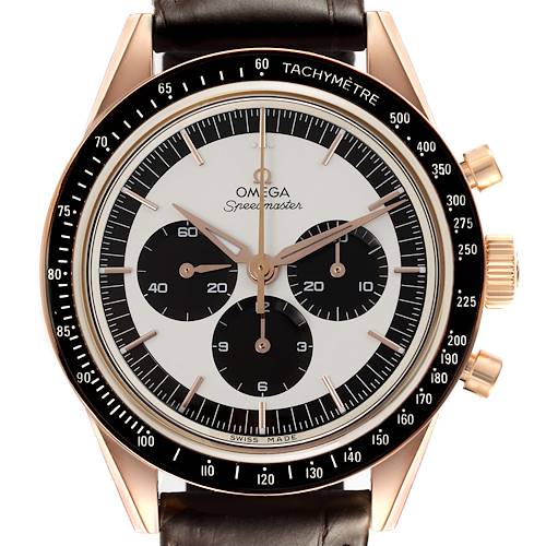 The Omega Speedmaster watch is shown from the front, displaying the dial, bezels, and pushers.