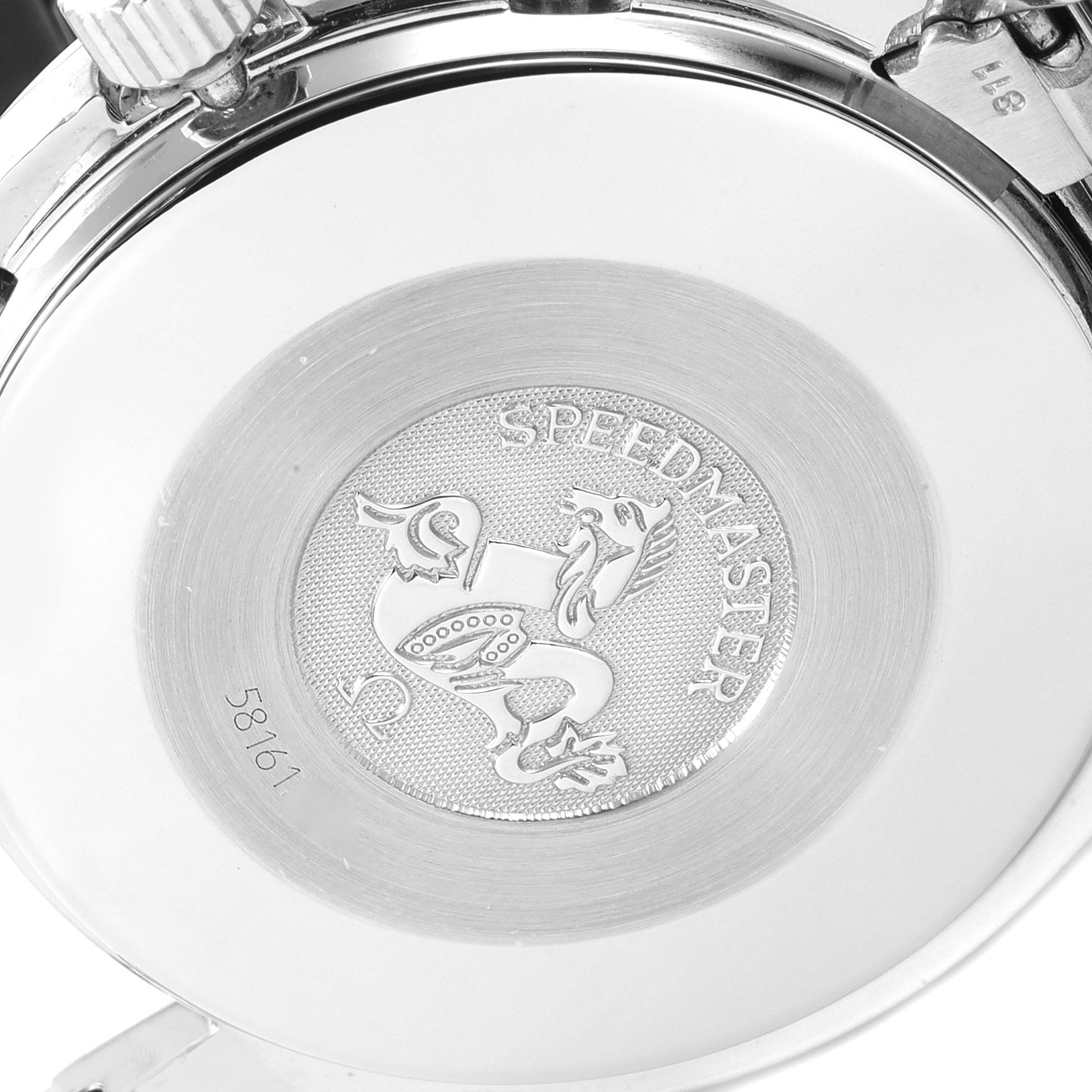 This image shows the back case of an Omega Speedmaster 3510.50.00 Men
s Stainless Steel Black Dial 3510.50.00 Men
s Stainless Steel Black Dial watch with its engraving and partial bracelet links.