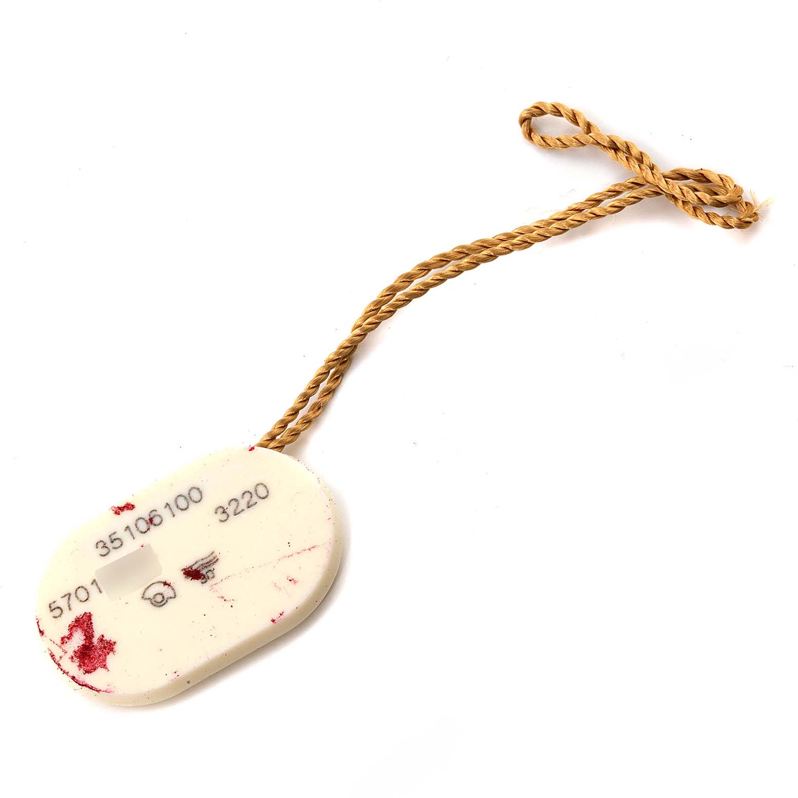 This image shows a Speedmaster tag by Omega, featuring a white oval shape with a printed watch reference and a brown string.