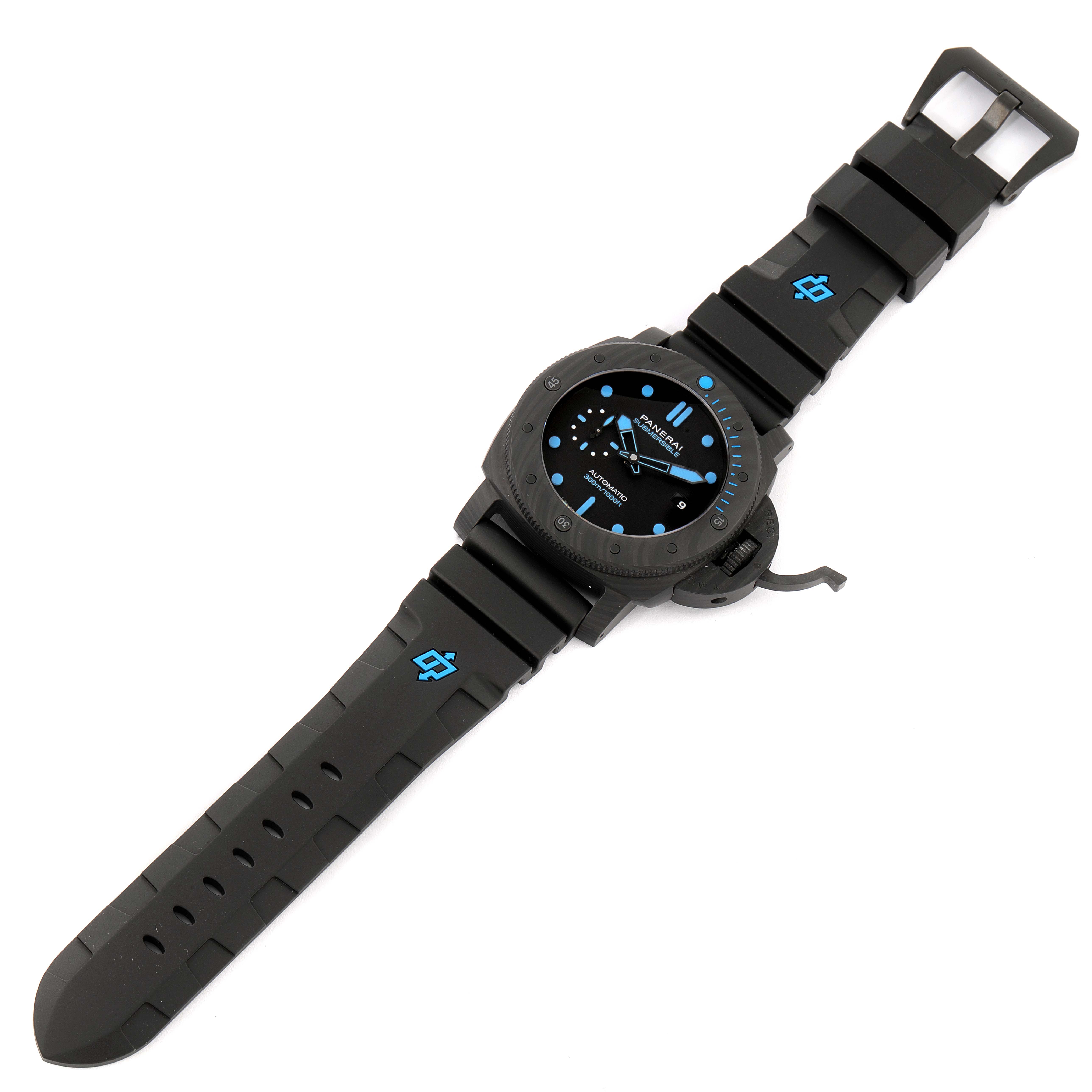 The Panerai Submersible PAM01616 Men's Ceramic Black Dial PAM01616 Men's Ceramic Black Dial watch is shown from a top-down angle, displaying the face, case, and strap.