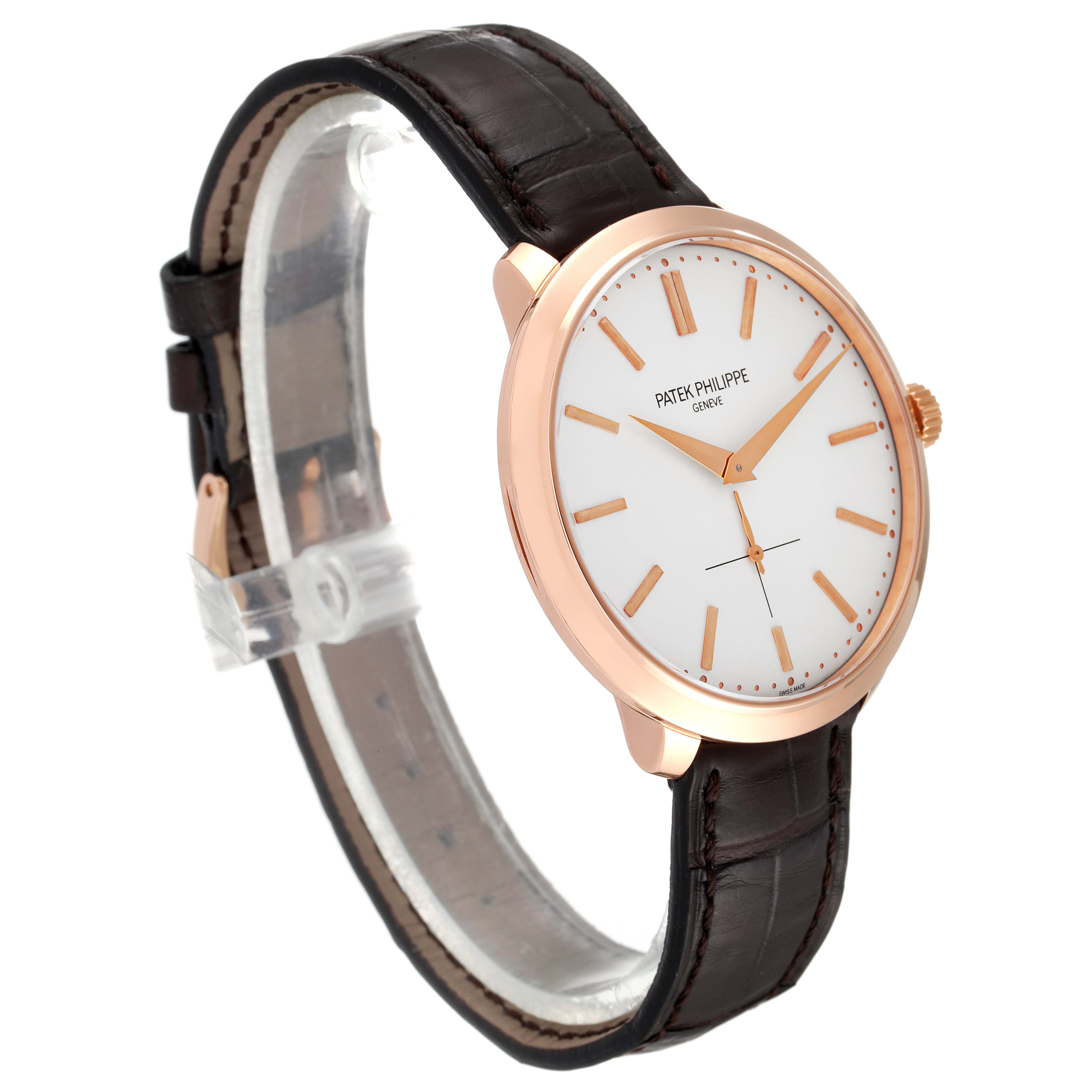 The image shows a side angle of the Patek Philippe Calatrava 5123R-001 Men's Rose Gold Silver Dial 5123R-001 Men's Rose Gold Silver Dial watch, highlighting its brown leather strap and minimalist white dial.