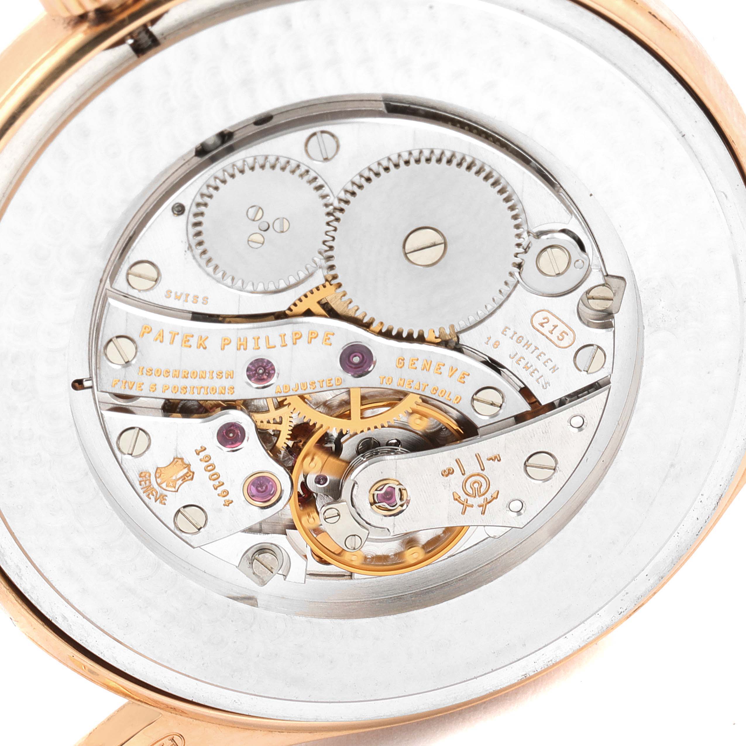 The image shows the movement and inner workings of a Patek Philippe Calatrava 5196R Men's Rose Gold Silver Dial 5196R Men's Rose Gold Silver Dial watch from a close-up back angle.