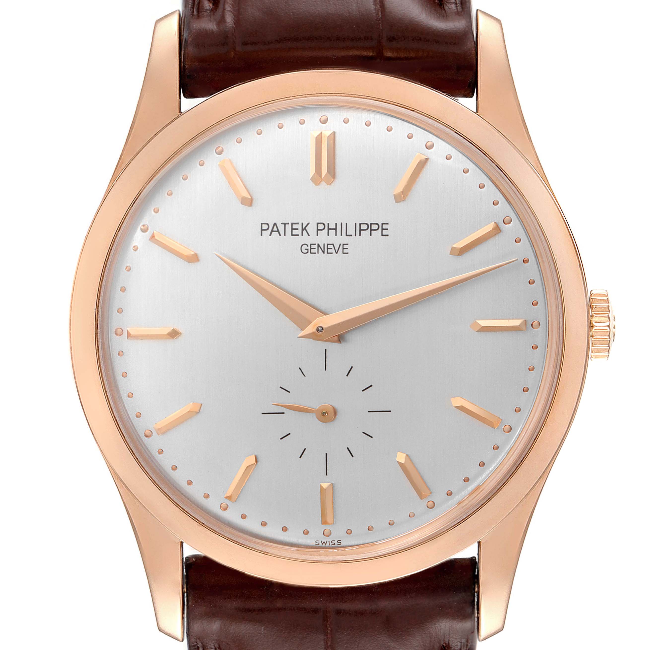 The image shows a frontal view of a Patek Philippe Calatrava 5196R Men's Rose Gold Silver Dial 5196R Men's Rose Gold Silver Dial watch, highlighting its dial, hands, bezel, and part of the strap.