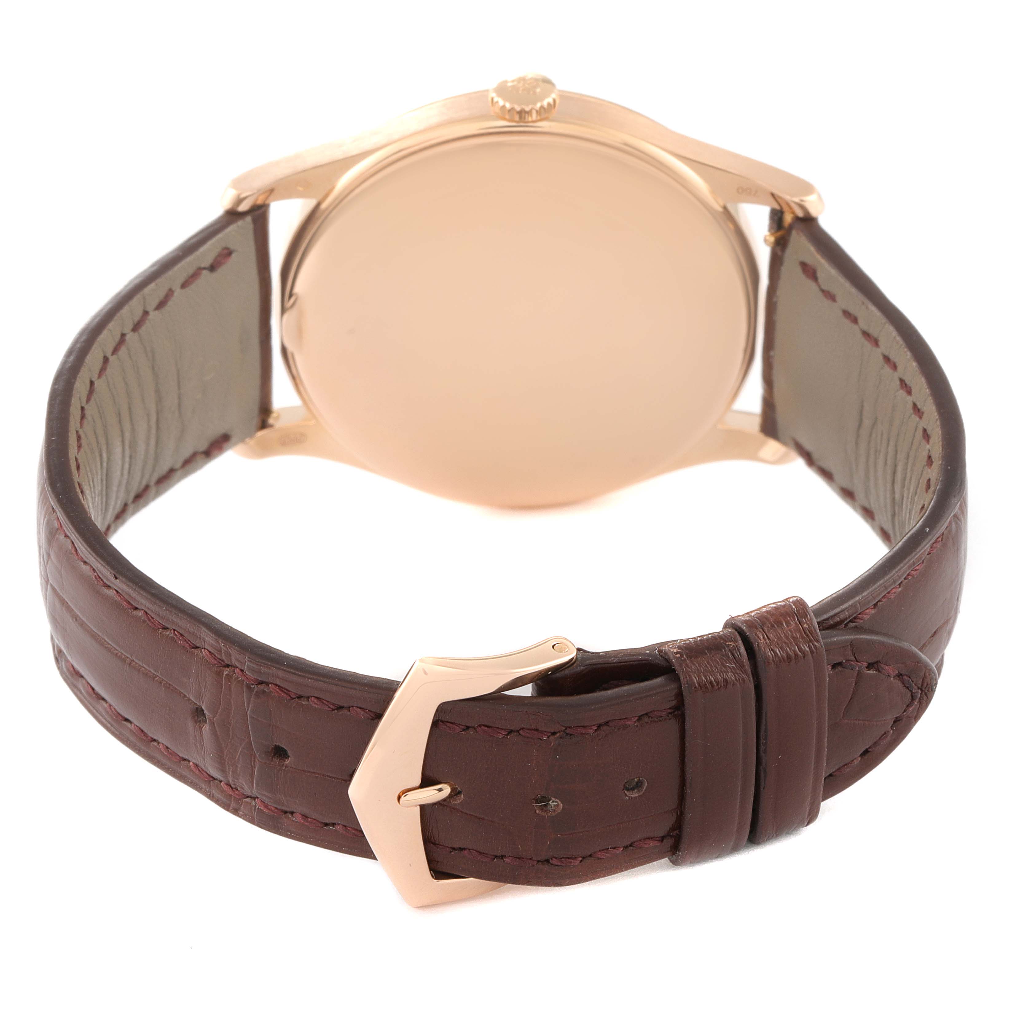 The image shows the back case and leather strap of a Patek Philippe Calatrava 5196R Men's Rose Gold Silver Dial 5196R Men's Rose Gold Silver Dial watch, including the buckle and crown.