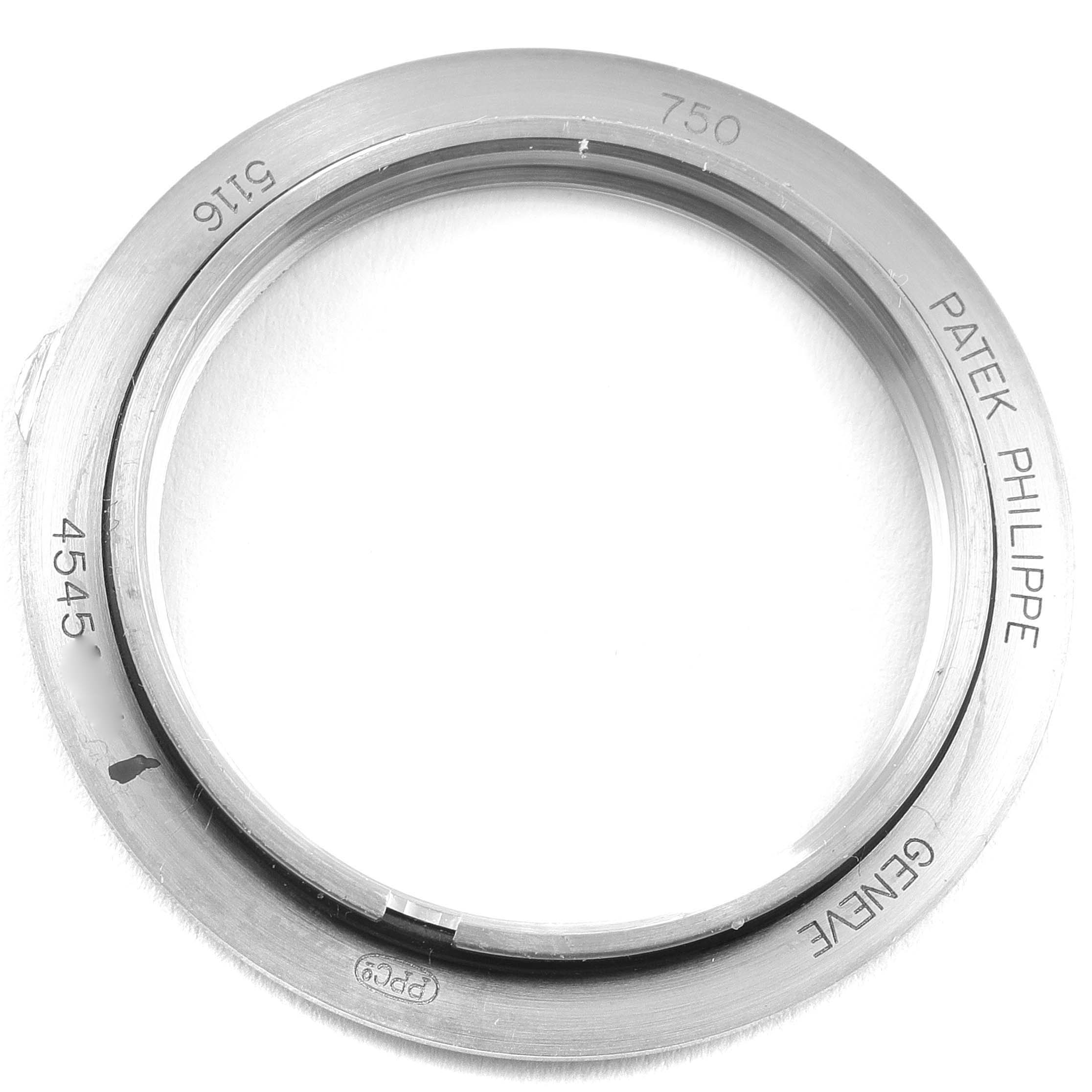 This image shows a top view of the bezel from a Patek Philippe Calatrava 5119G Men
s White Gold White Dial 5119G Men
s White Gold White Dial watch.