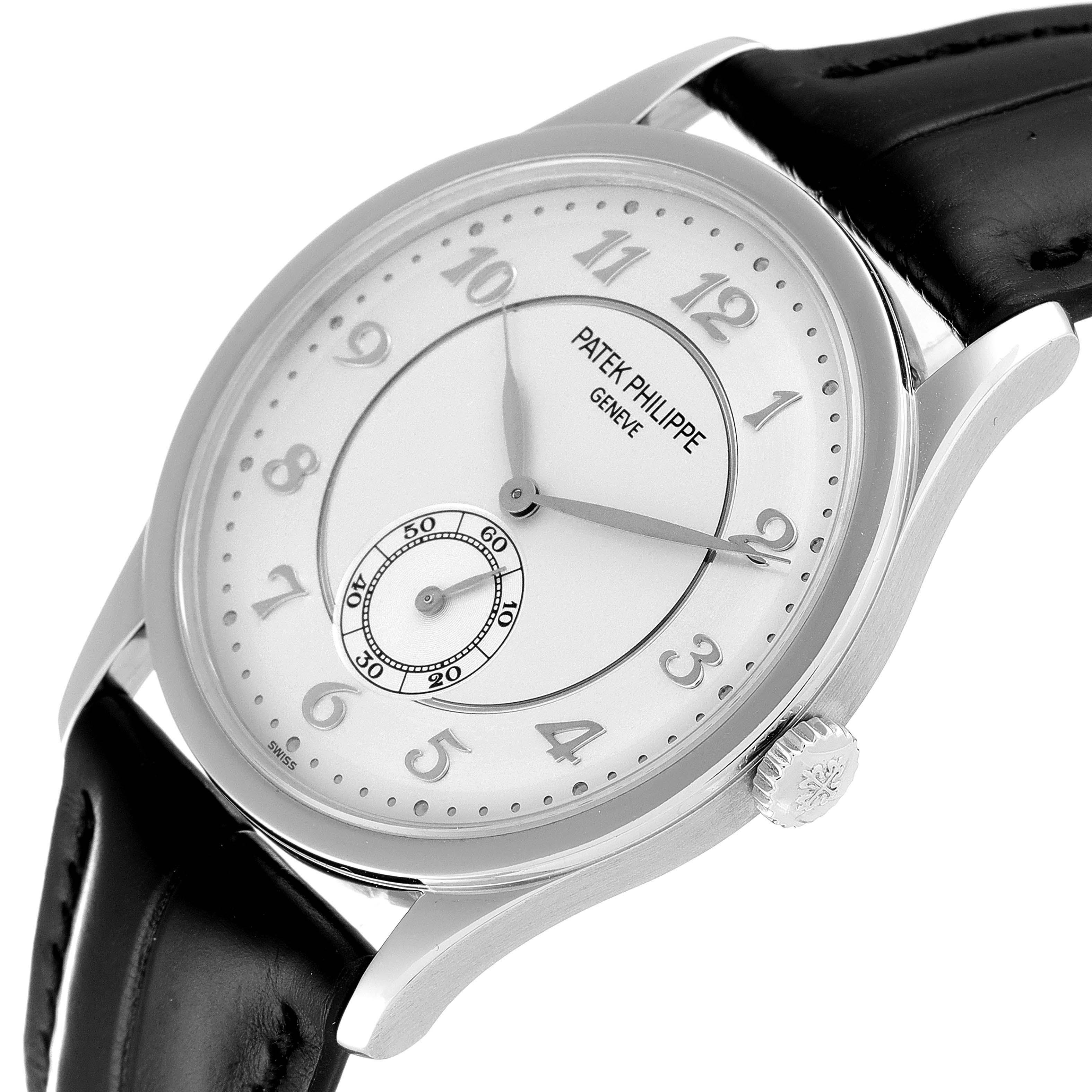The image shows a Patek Philippe Calatrava 5196P-001 Men's Platinum Silver Dial 5196P-001 Men's Platinum Silver Dial watch at a tilted angle, highlighting the dial, crown, and black leather strap.