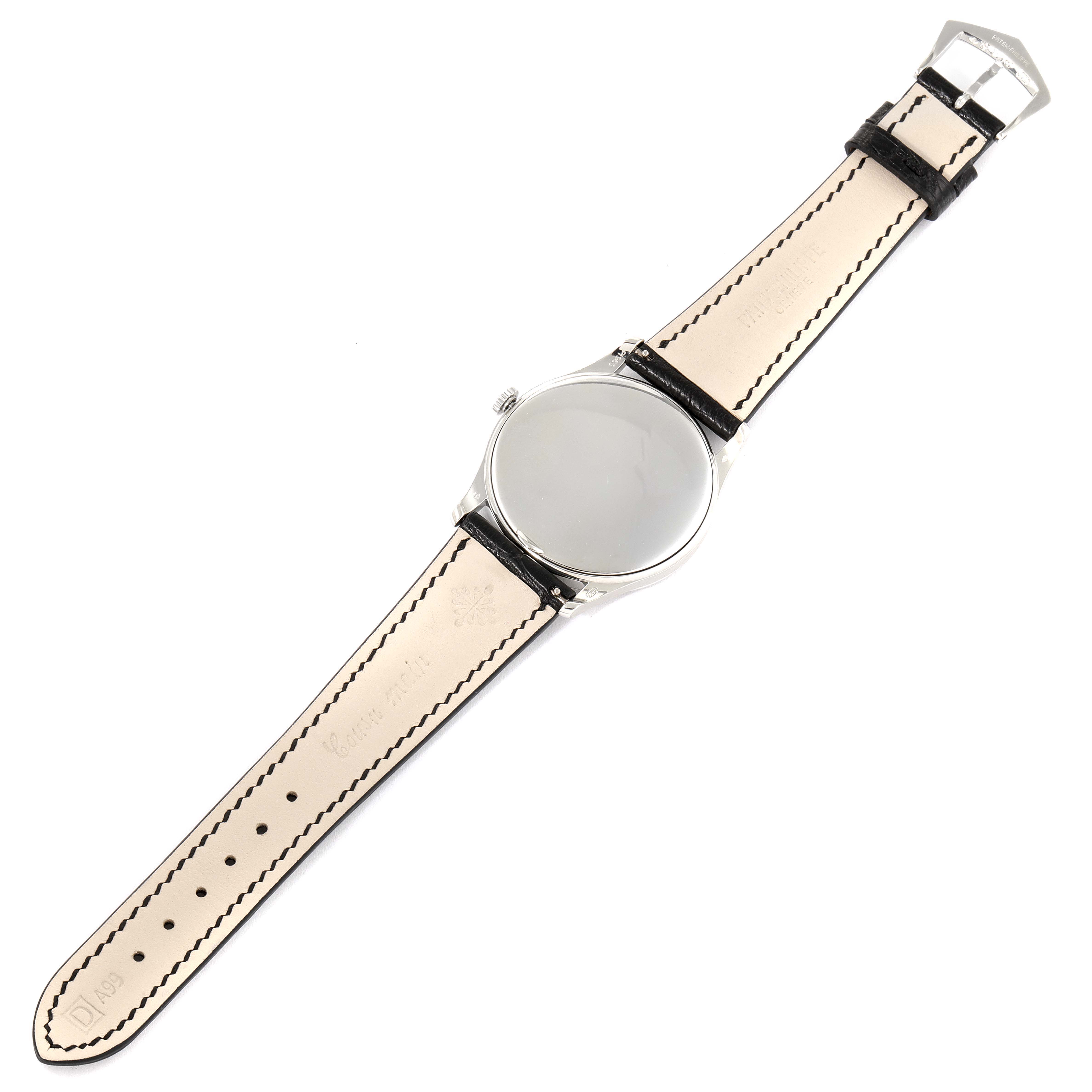 The Patek Philippe Calatrava 5196P-001 Men's Platinum Silver Dial 5196P-001 Men's Platinum Silver Dial watch is shown from the back, displaying its leather strap and caseback.