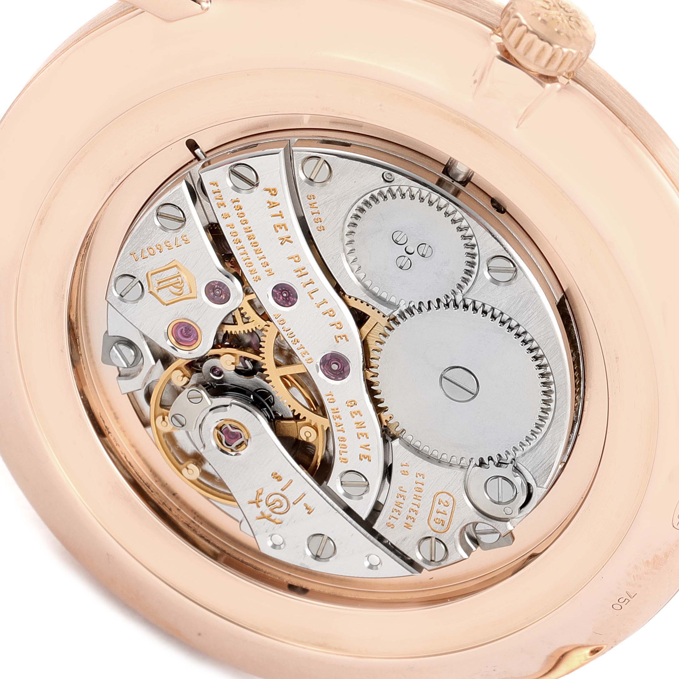 Close-up of the movement and inner mechanism of a Patek Philippe Calatrava 5119R Men's Rose Gold White Dial 5119R Men's Rose Gold White Dial watch, showcasing gears and components.