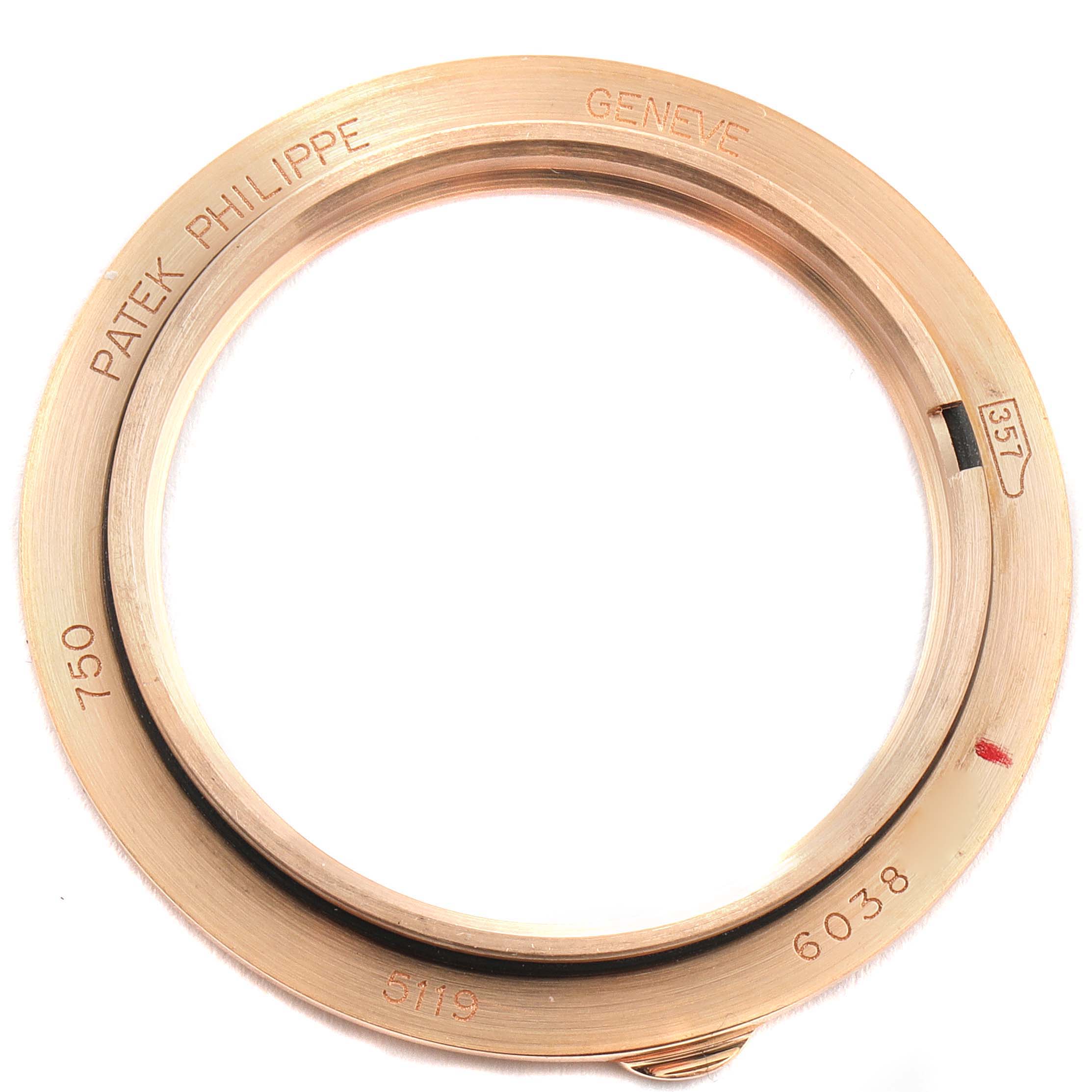 This image shows the rose gold bezel of a Patek Philippe Calatrava 5119R Men's Rose Gold White Dial 5119R Men's Rose Gold White Dial model watch.