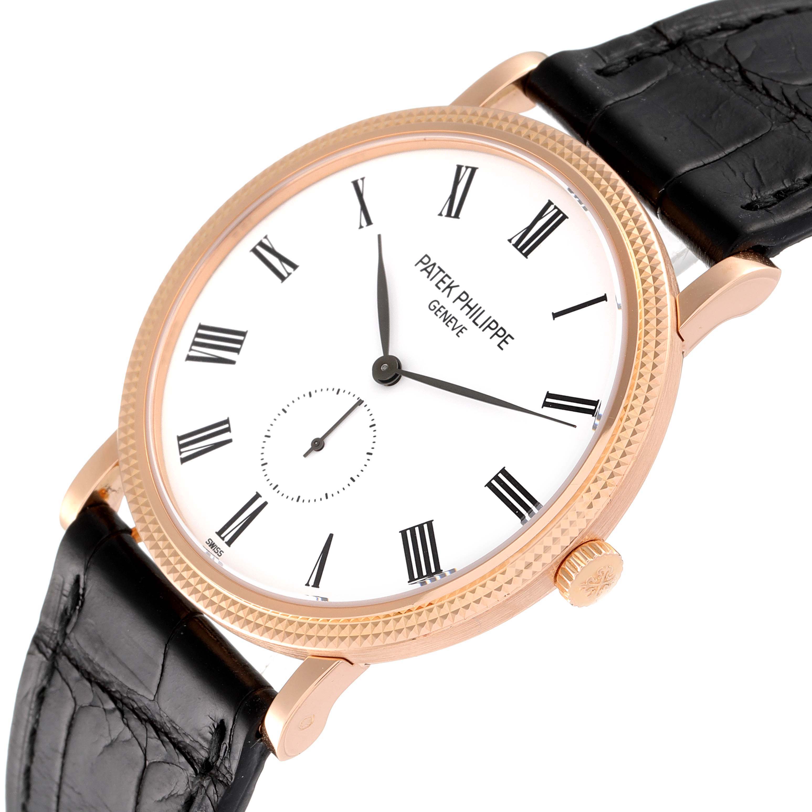 The image shows a Patek Philippe Calatrava 5119R Men's Rose Gold White Dial 5119R Men's Rose Gold White Dial watch at a slight angle, featuring its face, bezel, crown, and black leather strap.