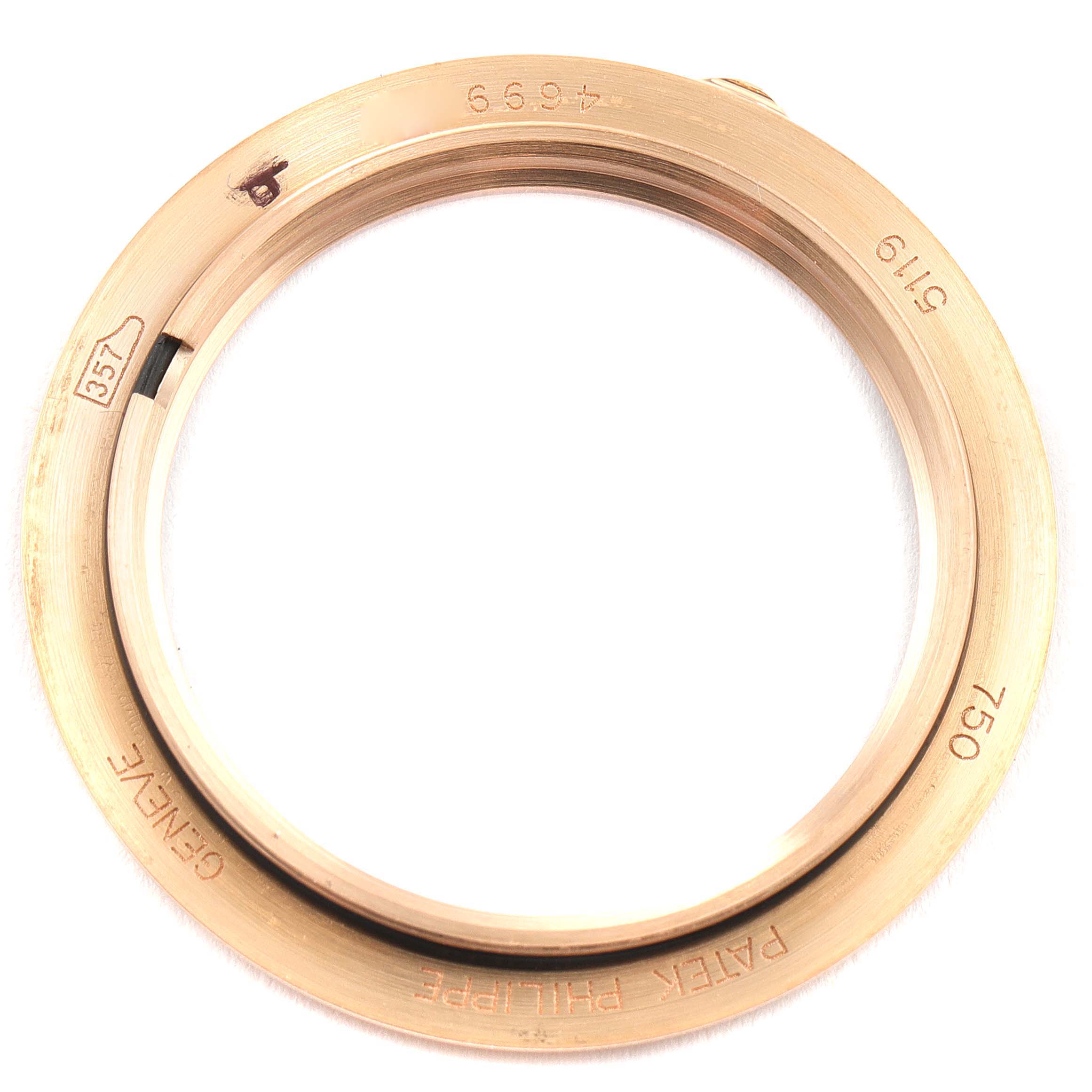 This image shows the bezel of a Patek Philippe Calatrava 5119R Men's Rose Gold White Dial 5119R Men's Rose Gold White Dial watch, viewed from above.