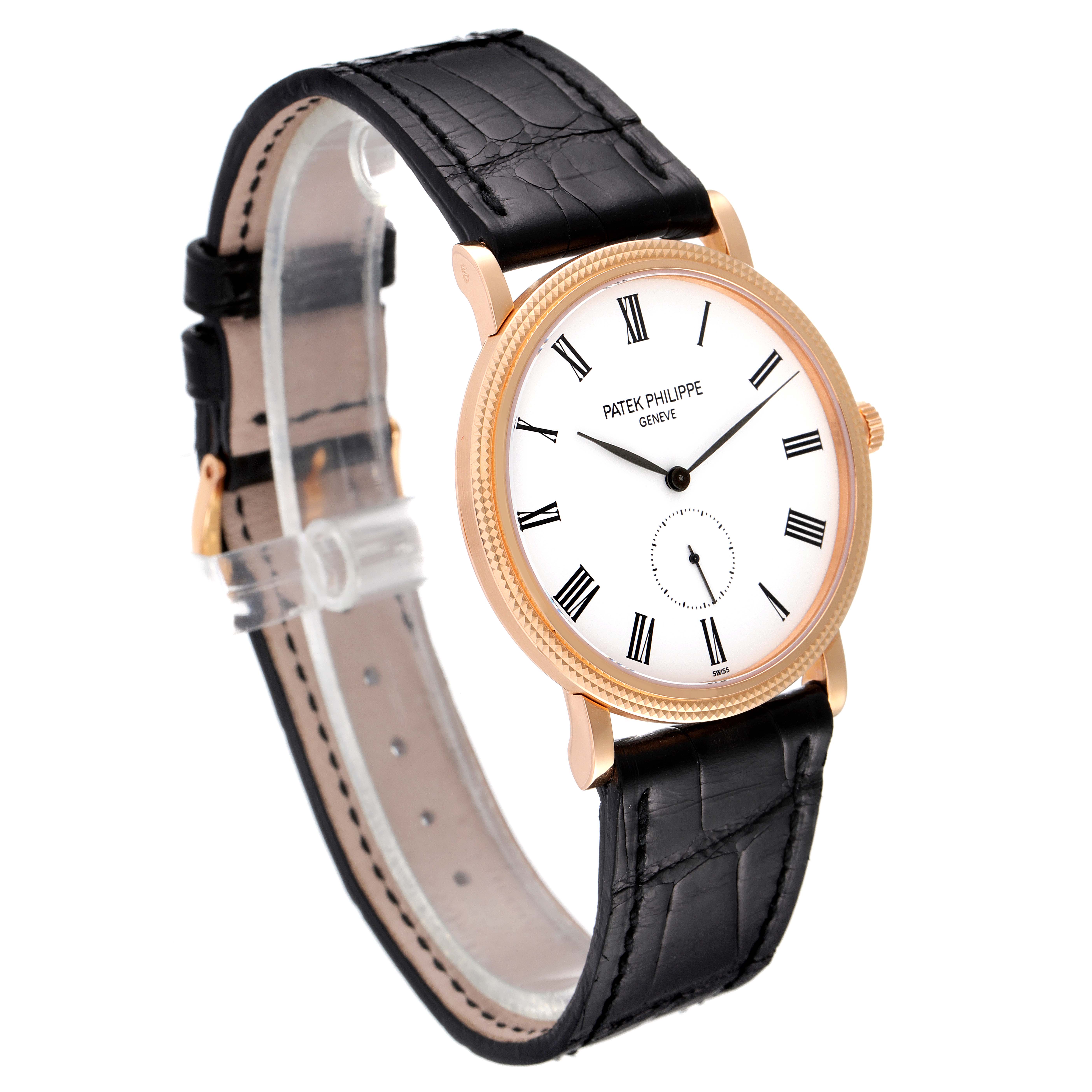 The image shows a Patek Philippe Calatrava 5119R Men's Rose Gold White Dial 5119R Men's Rose Gold White Dial watch with a side angle, highlighting the black leather strap and white dial with Roman numerals.