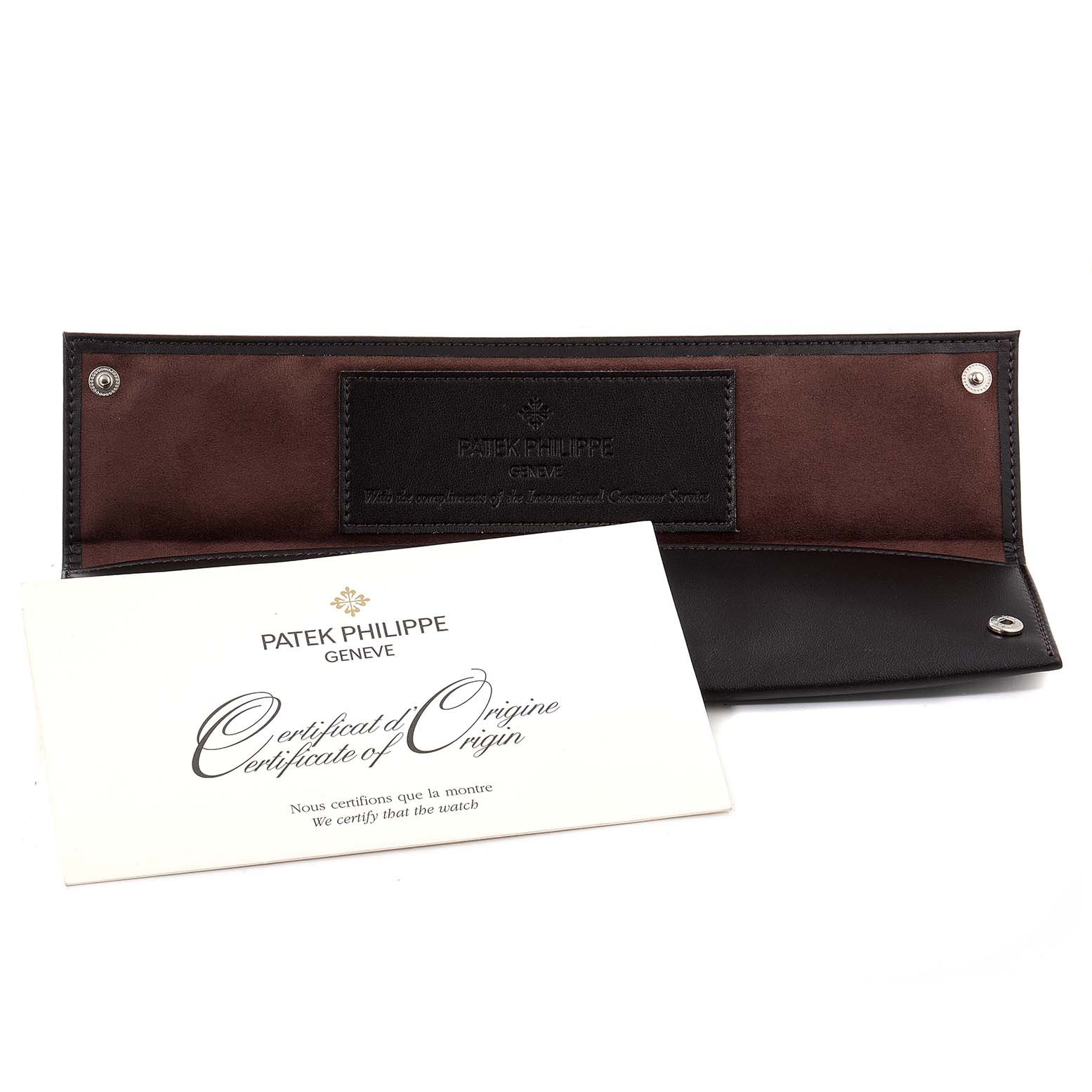 The image shows a Patek Philippe Calatrava 5119R Men's Rose Gold White Dial 5119R Men's Rose Gold White Dial watch pouch and an unfolded certificate of origin.