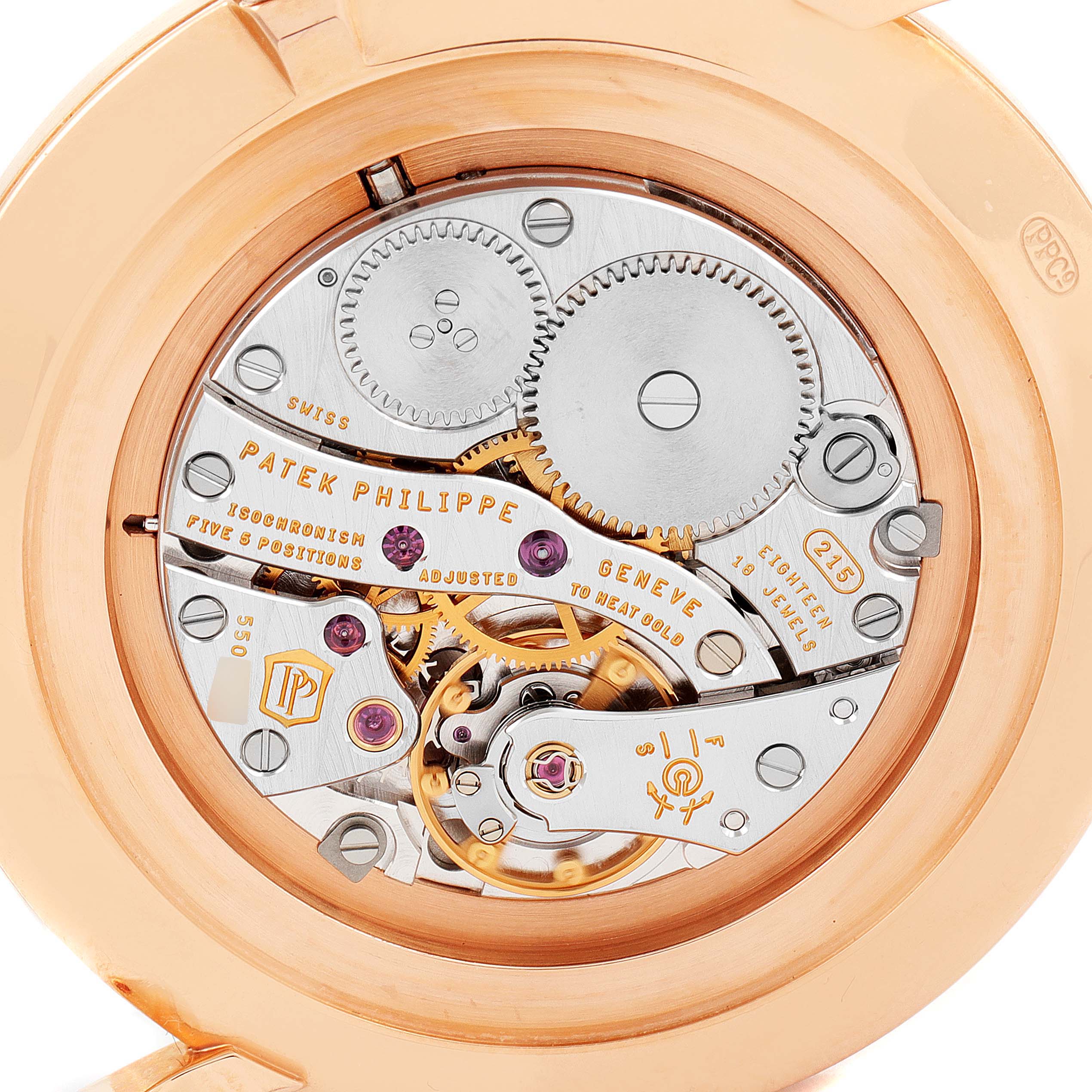 This image shows the intricate internal mechanism of a Patek Philippe Calatrava 5119R Men's Rose Gold White Dial 5119R Men's Rose Gold White Dial watch viewed from the back.