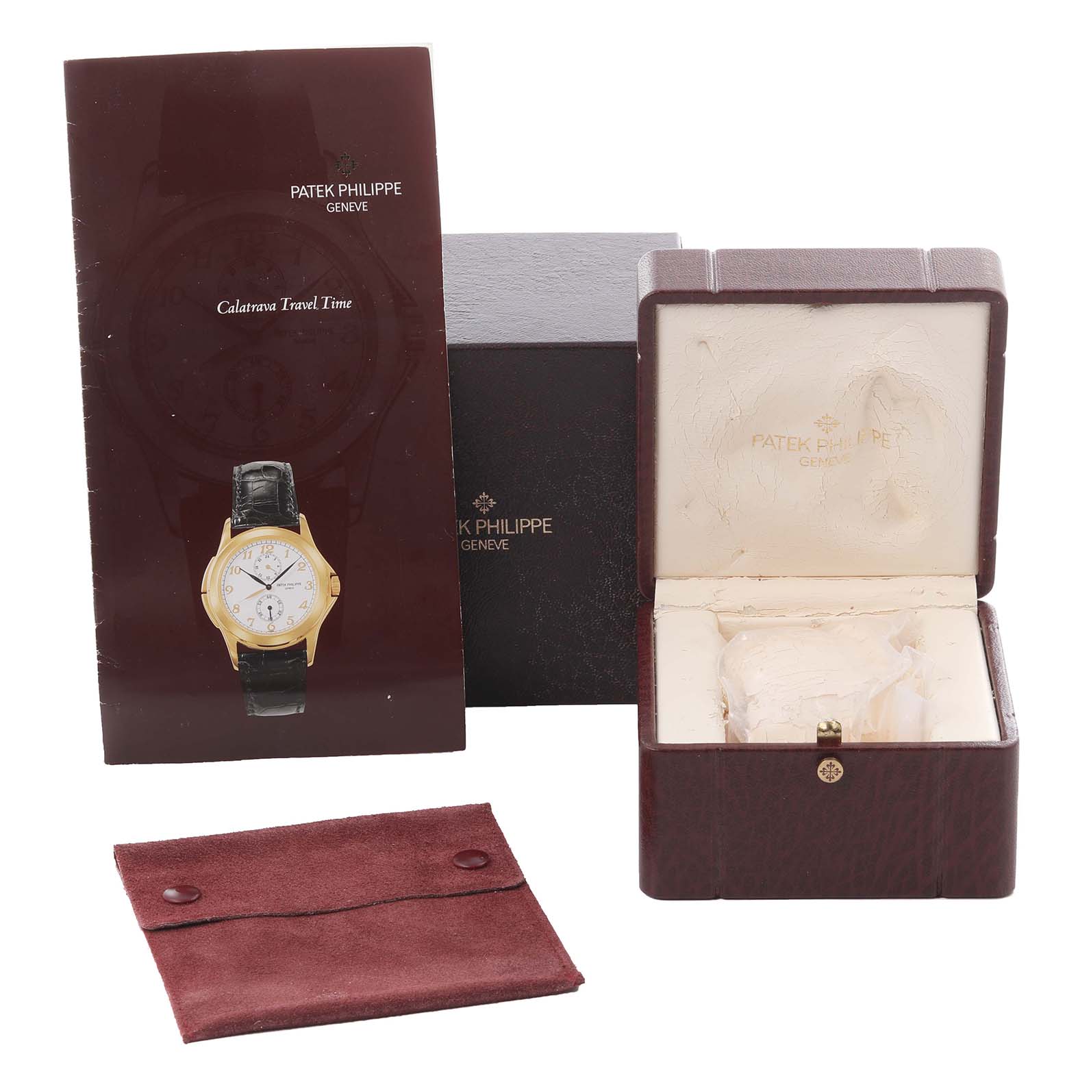 The image shows the Patek Philippe Calatrava 5134G Men's White Gold White Dial 5134G Men's White Gold White Dial packaging, including the box, booklet, and a suede pouch.
