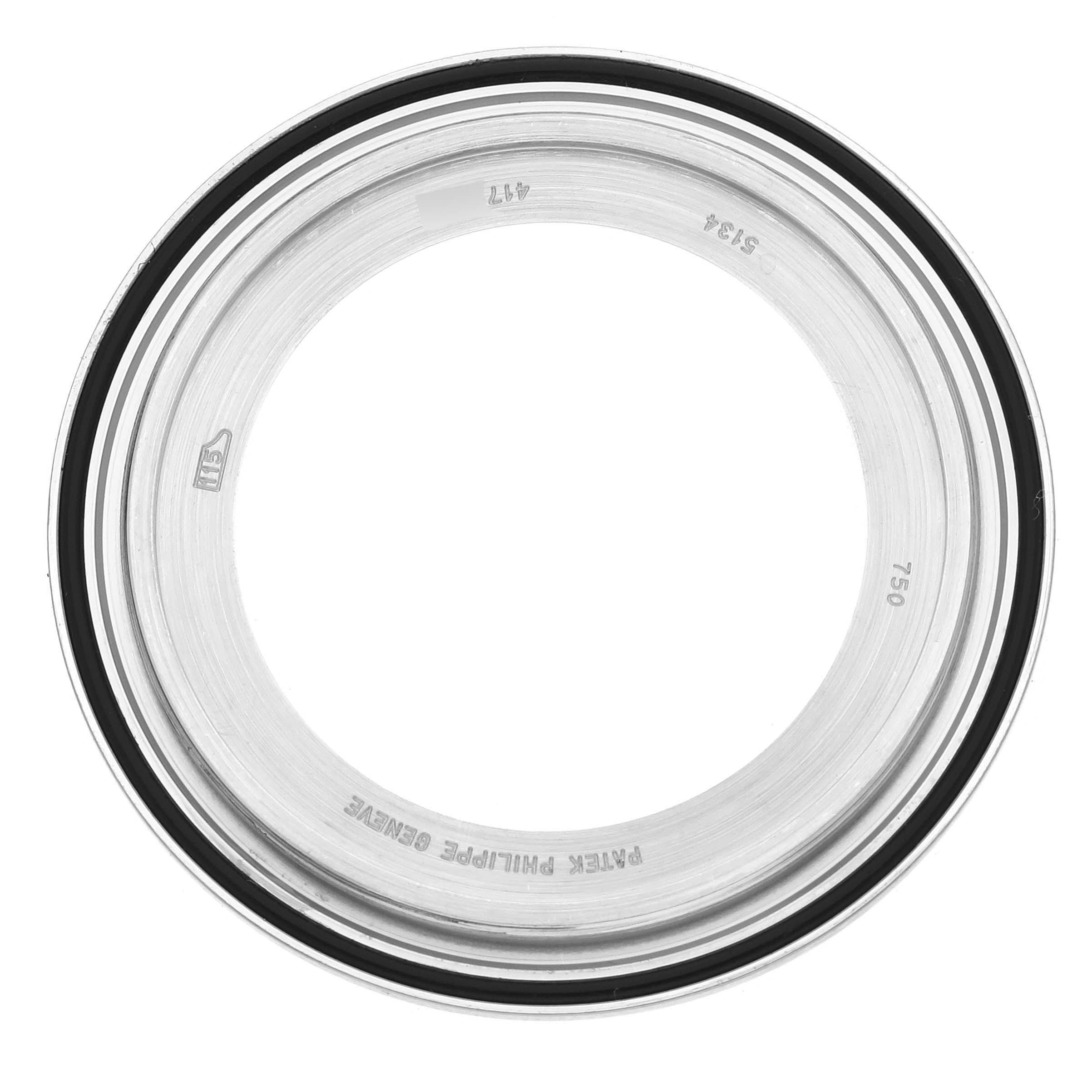 The image shows the case back of a Patek Philippe Calatrava 5134G Men's White Gold White Dial 5134G Men's White Gold White Dial, viewed from above.