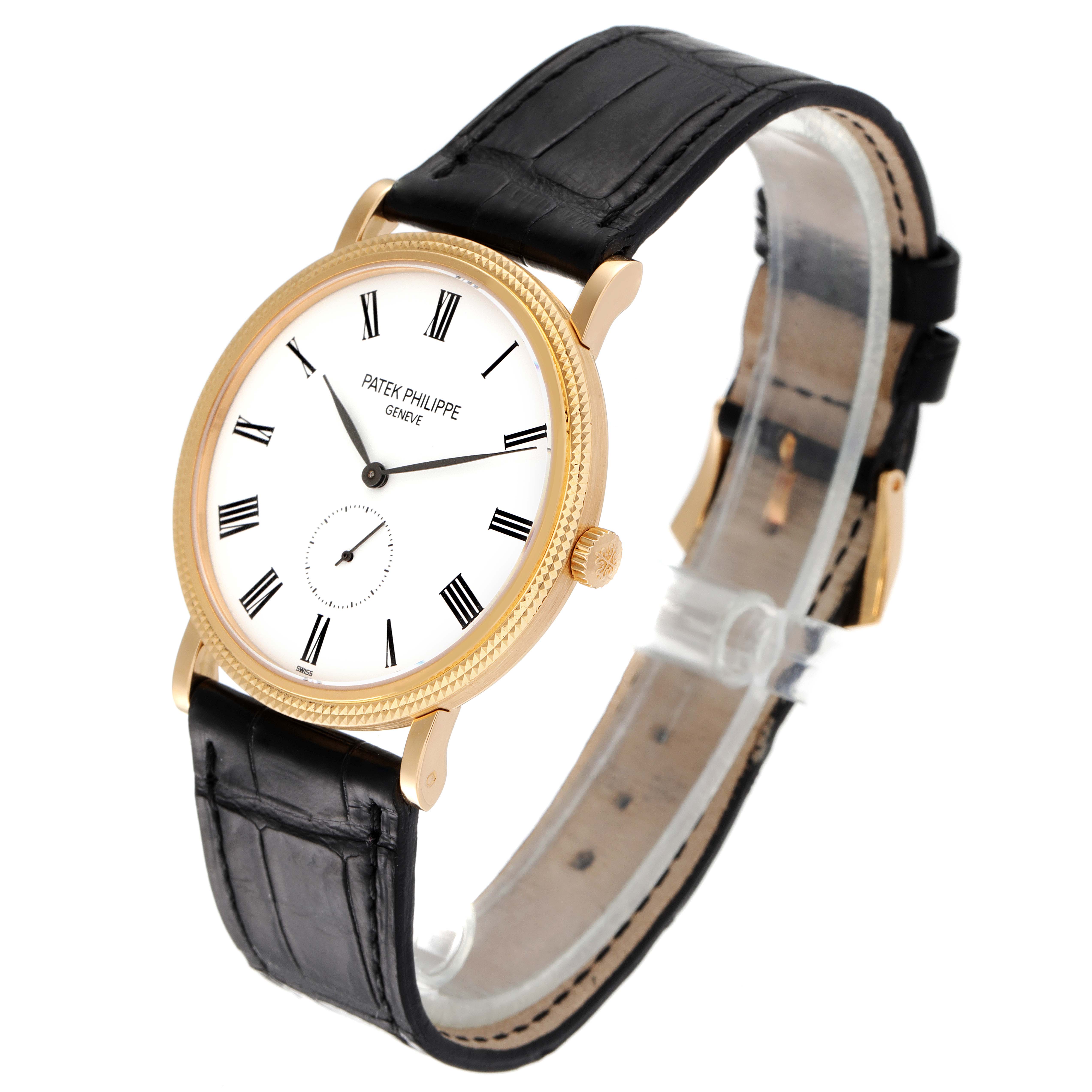 The image shows a side-angled view of the Calatrava watch by Patek Philippe, highlighting its dial, bezel, crown, and leather strap.