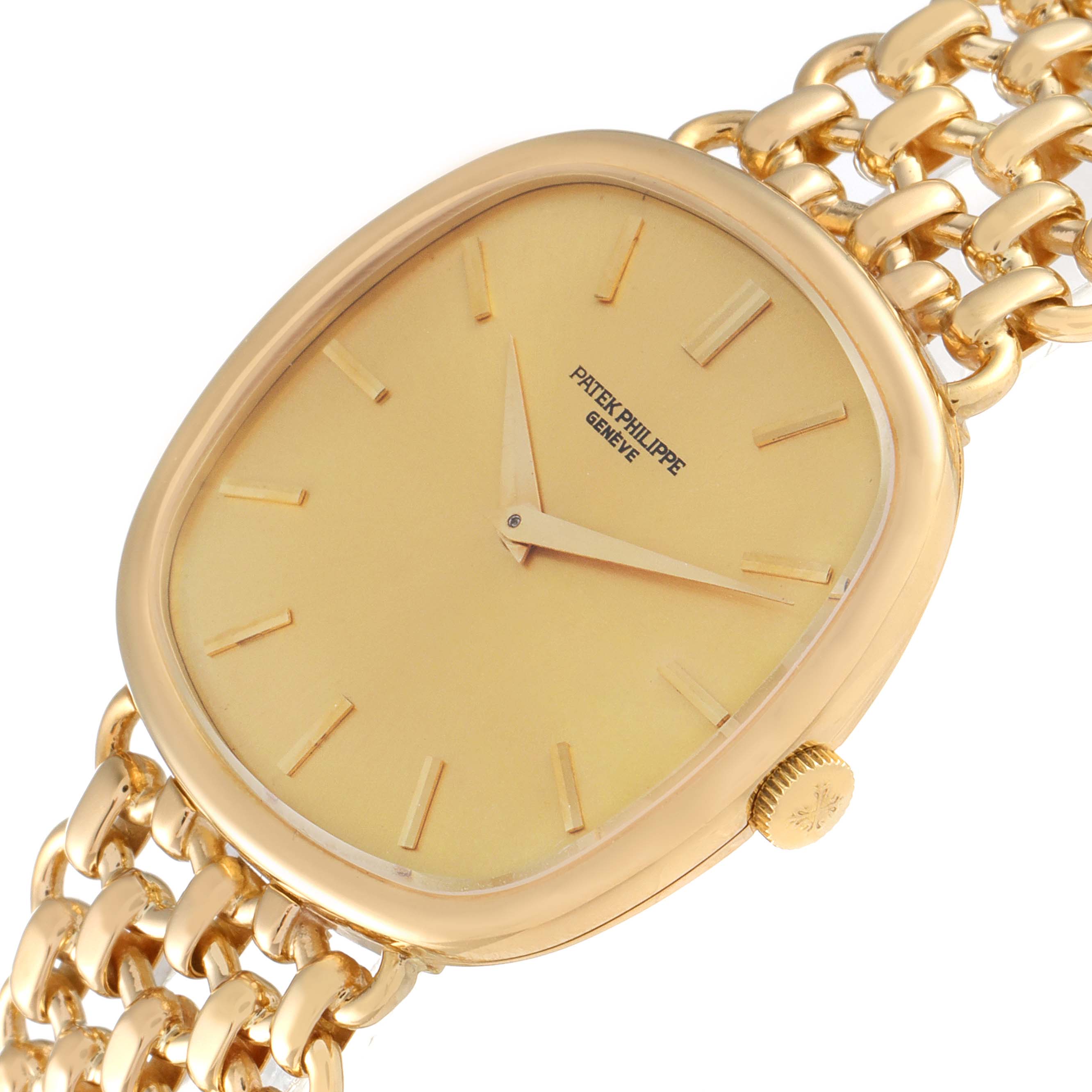 The angle shows the face, crown, and part of the bracelet of the Patek Philippe Golden Ellipse 3644 Men's Yellow Gold Champagne Dial 3644 Men's Yellow Gold Champagne Dial watch.