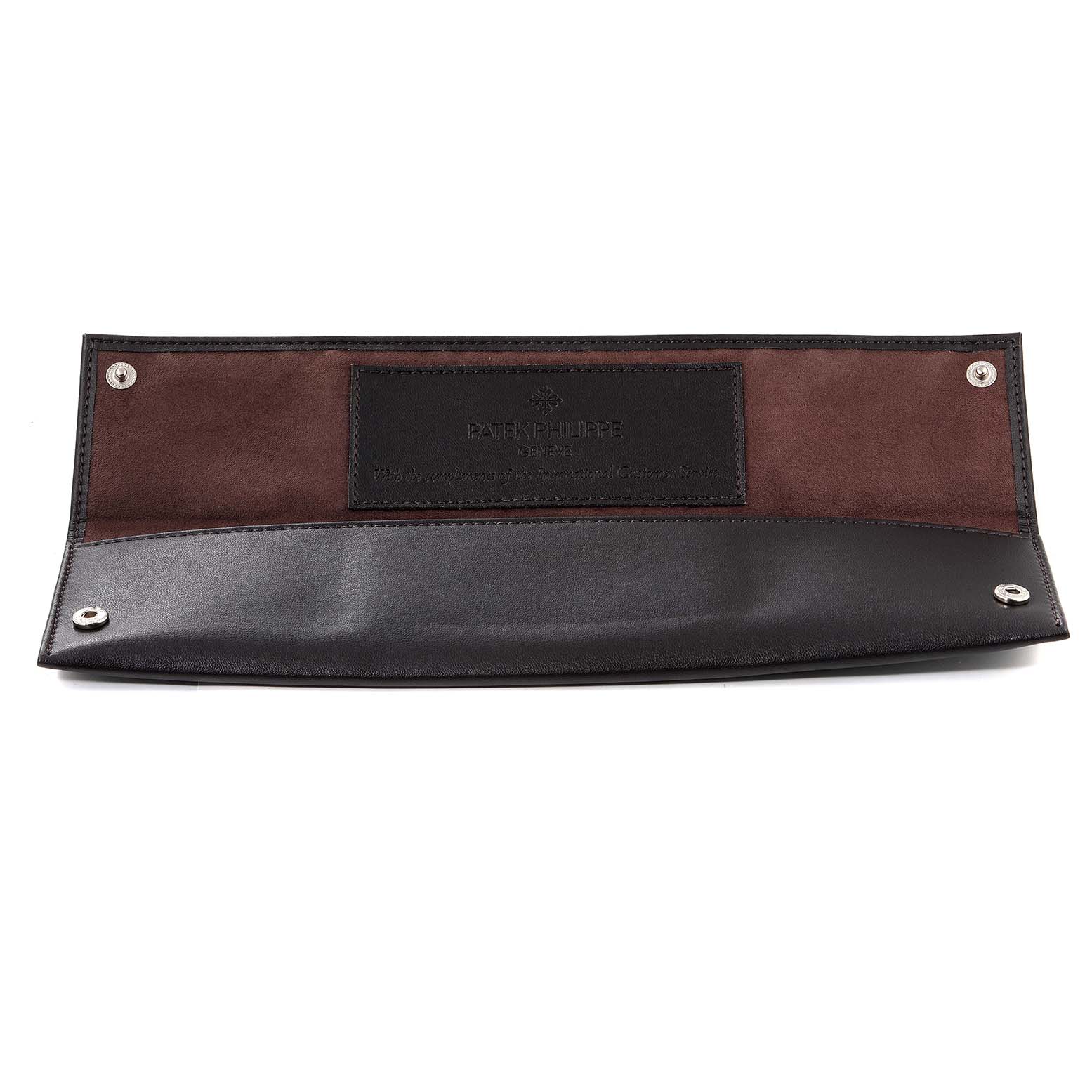 This image shows an open leather pouch for the Patek Philippe Gondolo 5098R Men's Rose Gold Silver Dial 5098R Men's Rose Gold Silver Dial watch, displaying the interior with snap closures.