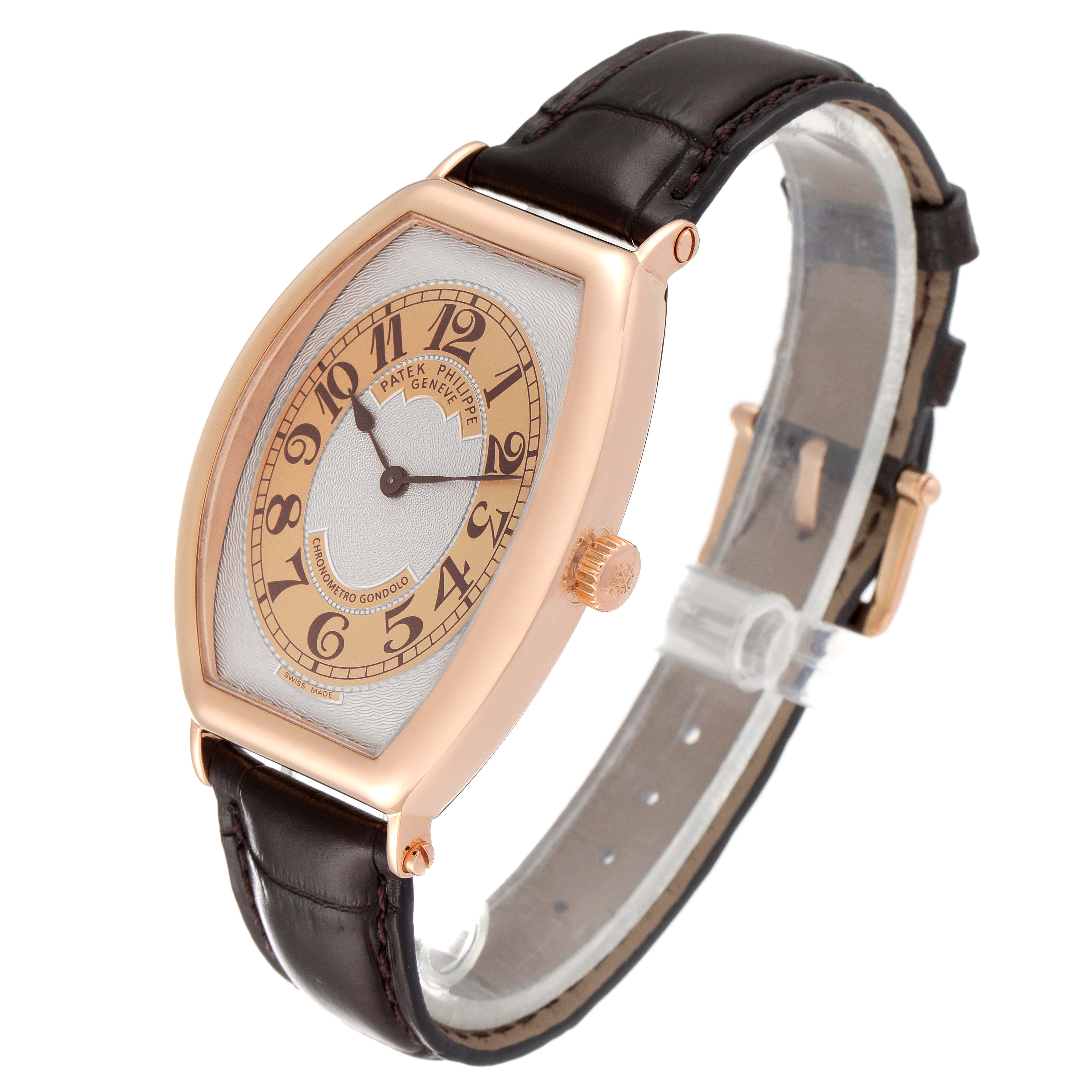 This image shows a side-angle view of the Patek Philippe Gondolo 5098R Men's Rose Gold Silver Dial 5098R Men's Rose Gold Silver Dial watch, highlighting its dial, case, and leather strap.