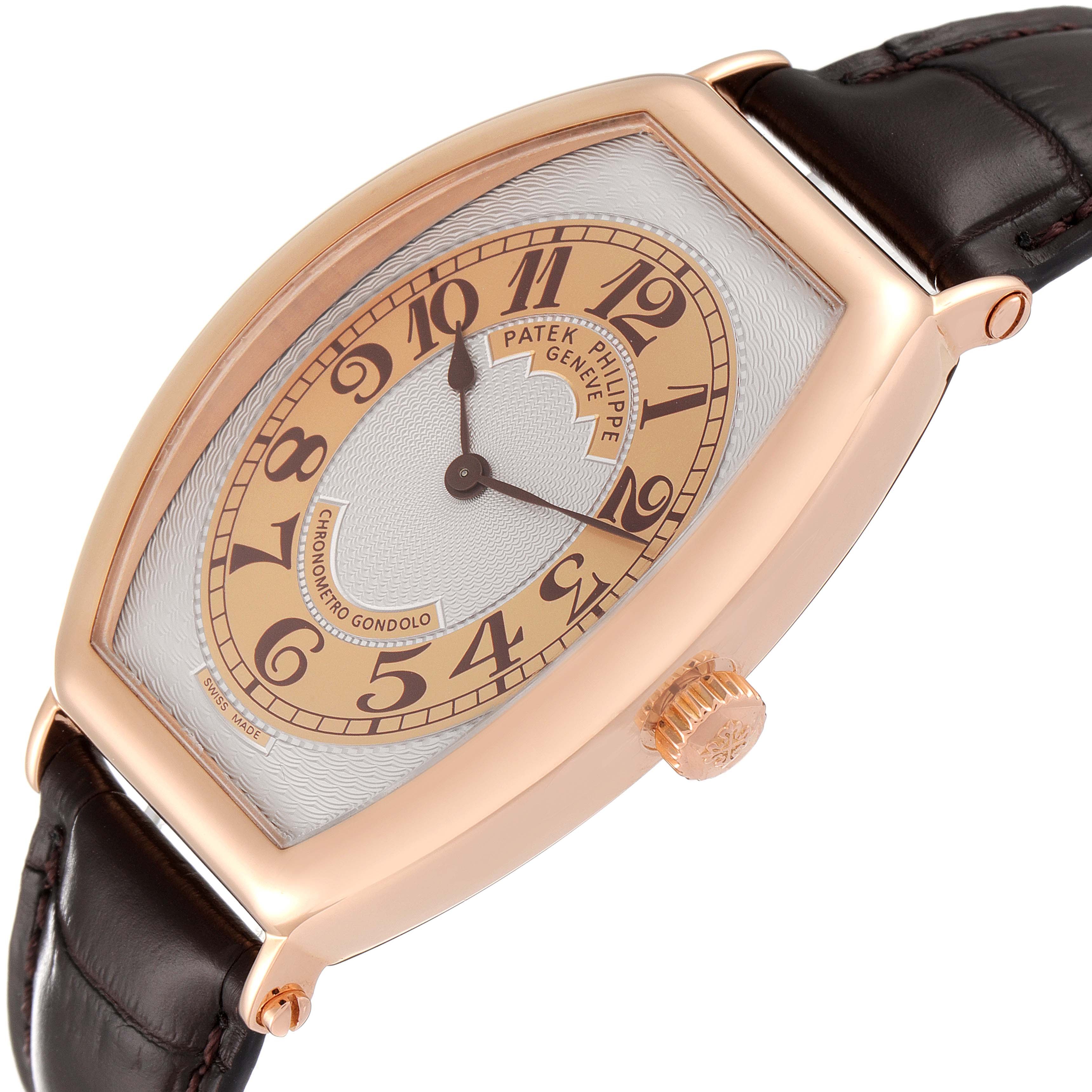 The Patek Philippe Gondolo 5098R Men's Rose Gold Silver Dial 5098R Men's Rose Gold Silver Dial watch is shown from an angled, slightly top-down view, highlighting the face, casing, and leather strap.