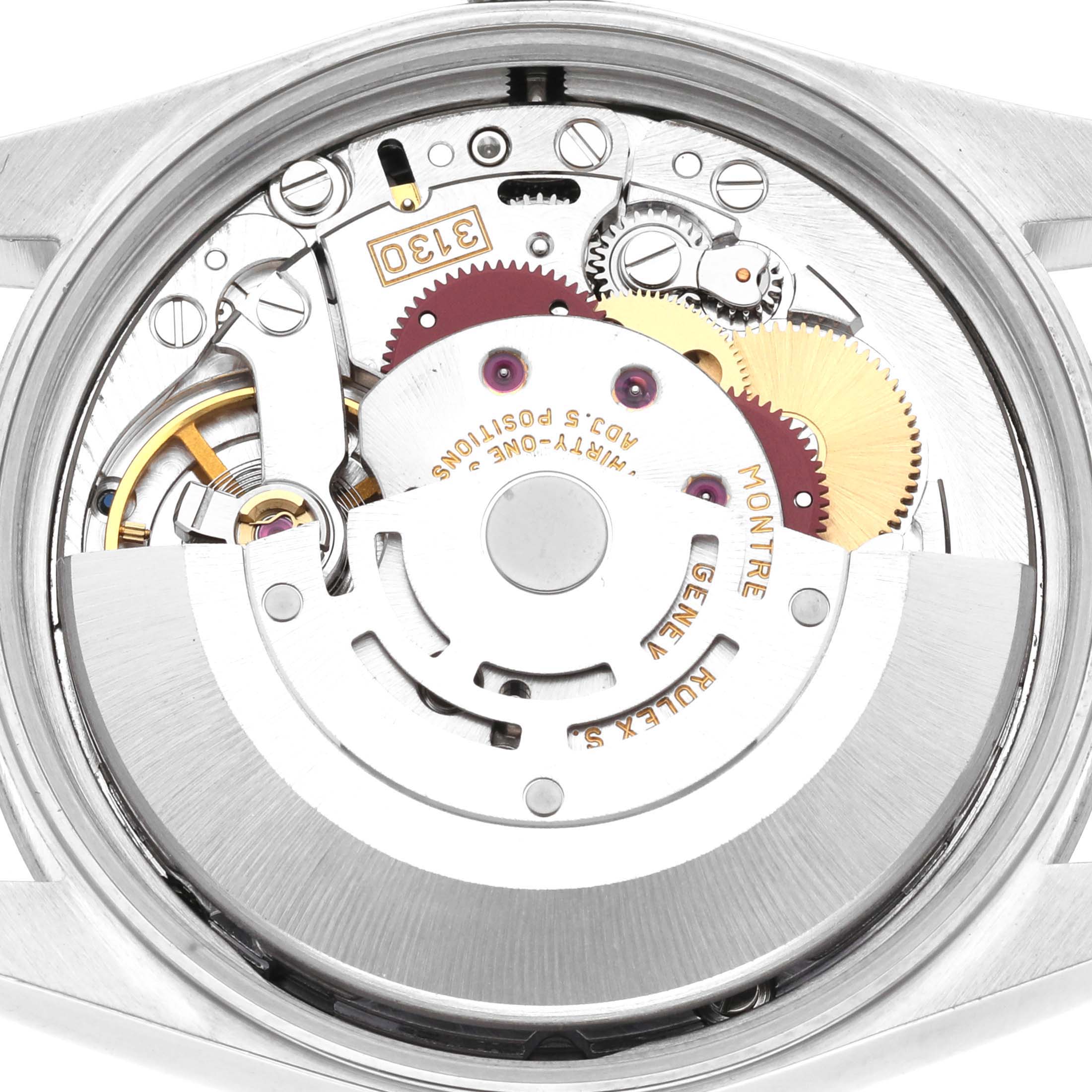 The image shows the movement mechanism of a Rolex Air-King 14000M Men's Stainless Steel Blue Dial 14000M Men's Stainless Steel Blue Dial watch from the back.