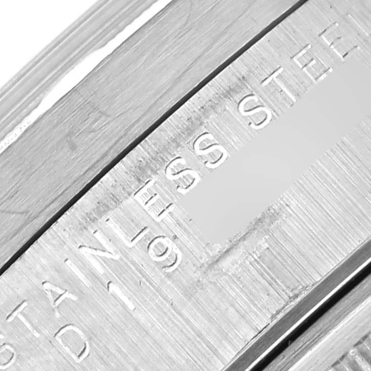 The image shows a close-up of the stainless steel bracelet of the Rolex Air-King 14010M Men's Stainless Steel Black Dial 14010M Men's Stainless Steel Black Dial, highlighting engraved details.