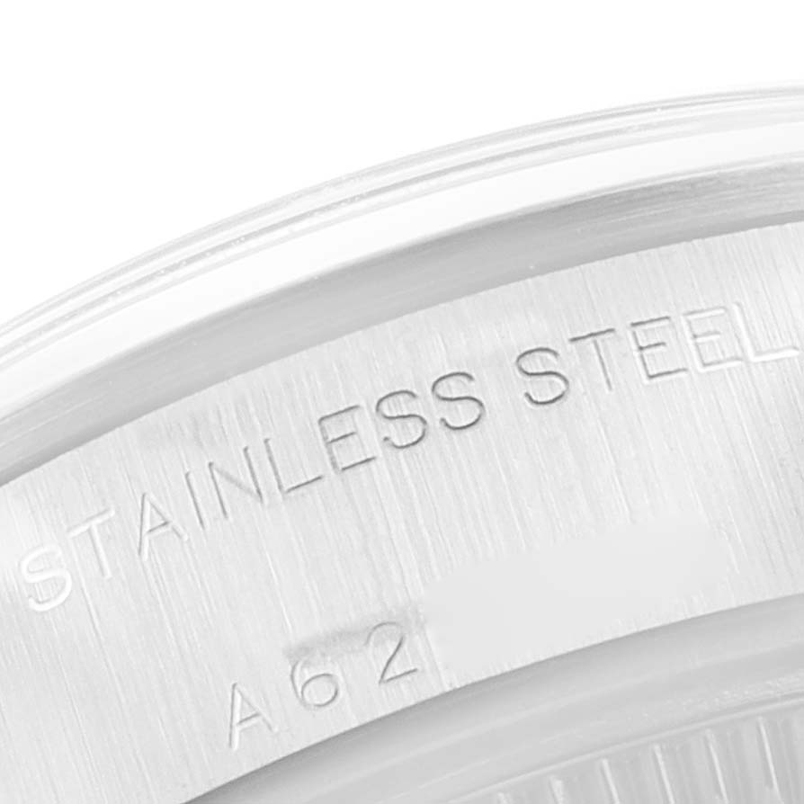 This image shows a close-up of the stainless steel case back of a Rolex Date 79160 Women's Stainless Steel White Dial 79160 Women's Stainless Steel White Dial model watch.