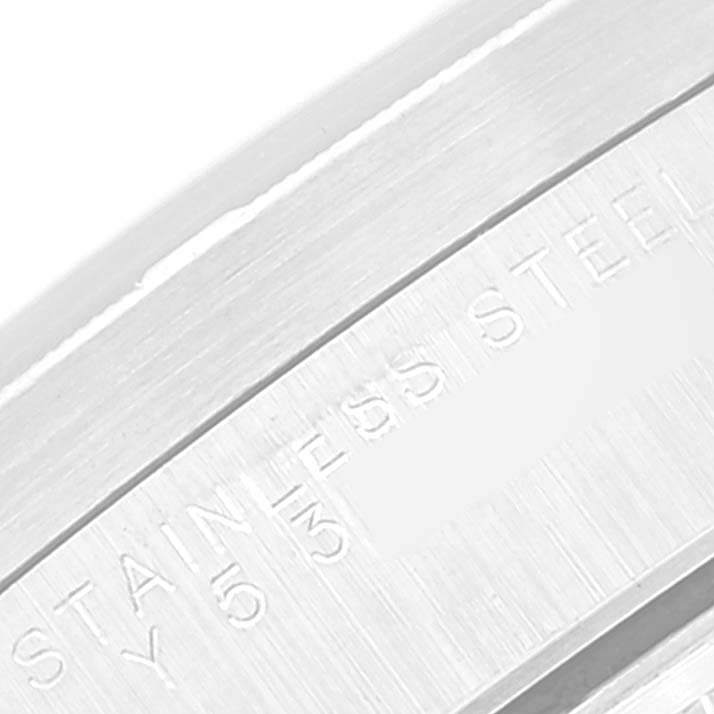 The image shows a close-up of the stainless steel case of the Rolex Date 15210 Men
s Stainless Steel Black Dial 15210 Men
s Stainless Steel Black Dial model watch.