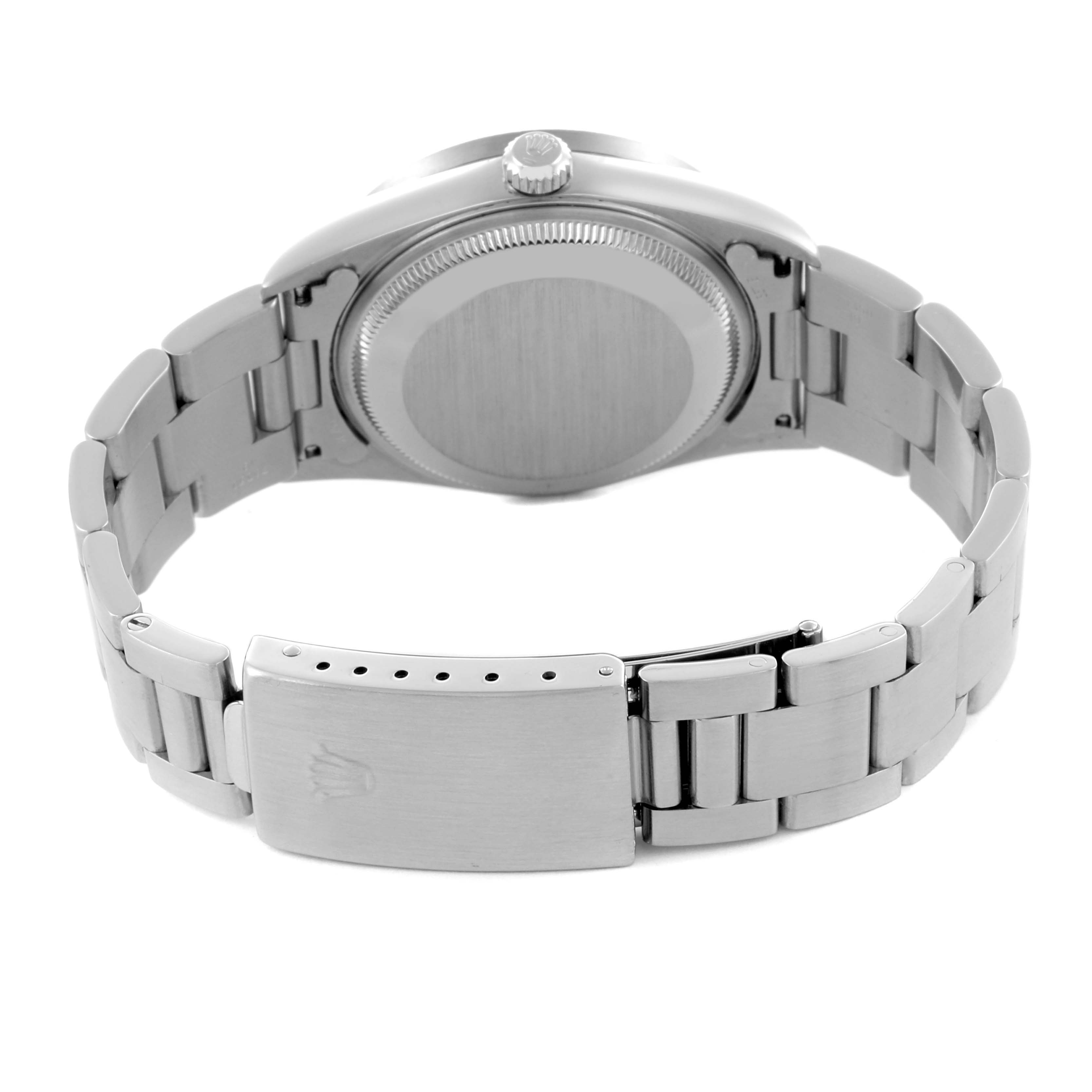 The image shows the back case and bracelet clasp of a Rolex Date 15210 Men's Stainless Steel Blue Dial 15210 Men's Stainless Steel Blue Dial watch.