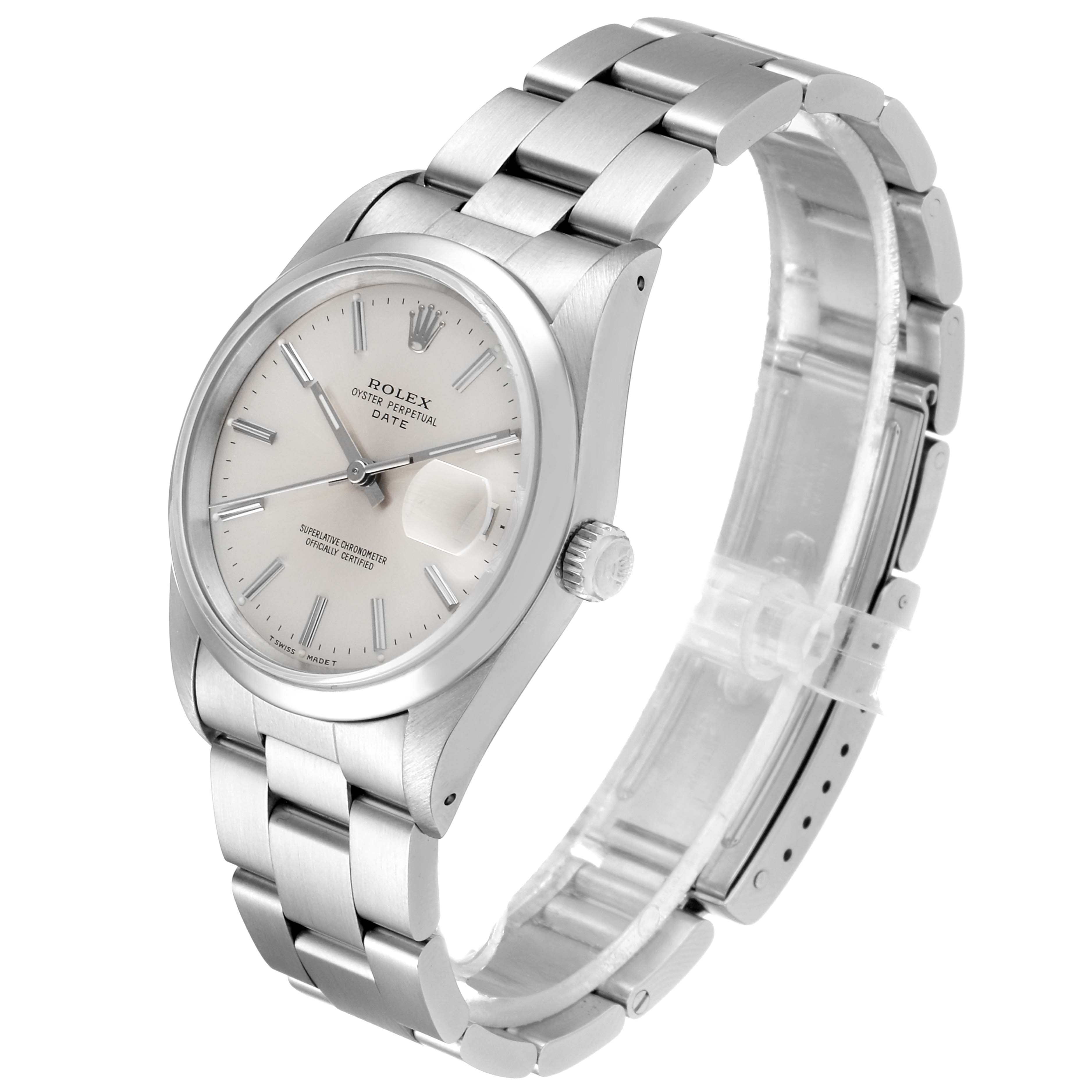 The image shows a Rolex Oyster Perpetual Date watch at a three-quarter angle, highlighting the dial, bezel, crown, and bracelet.