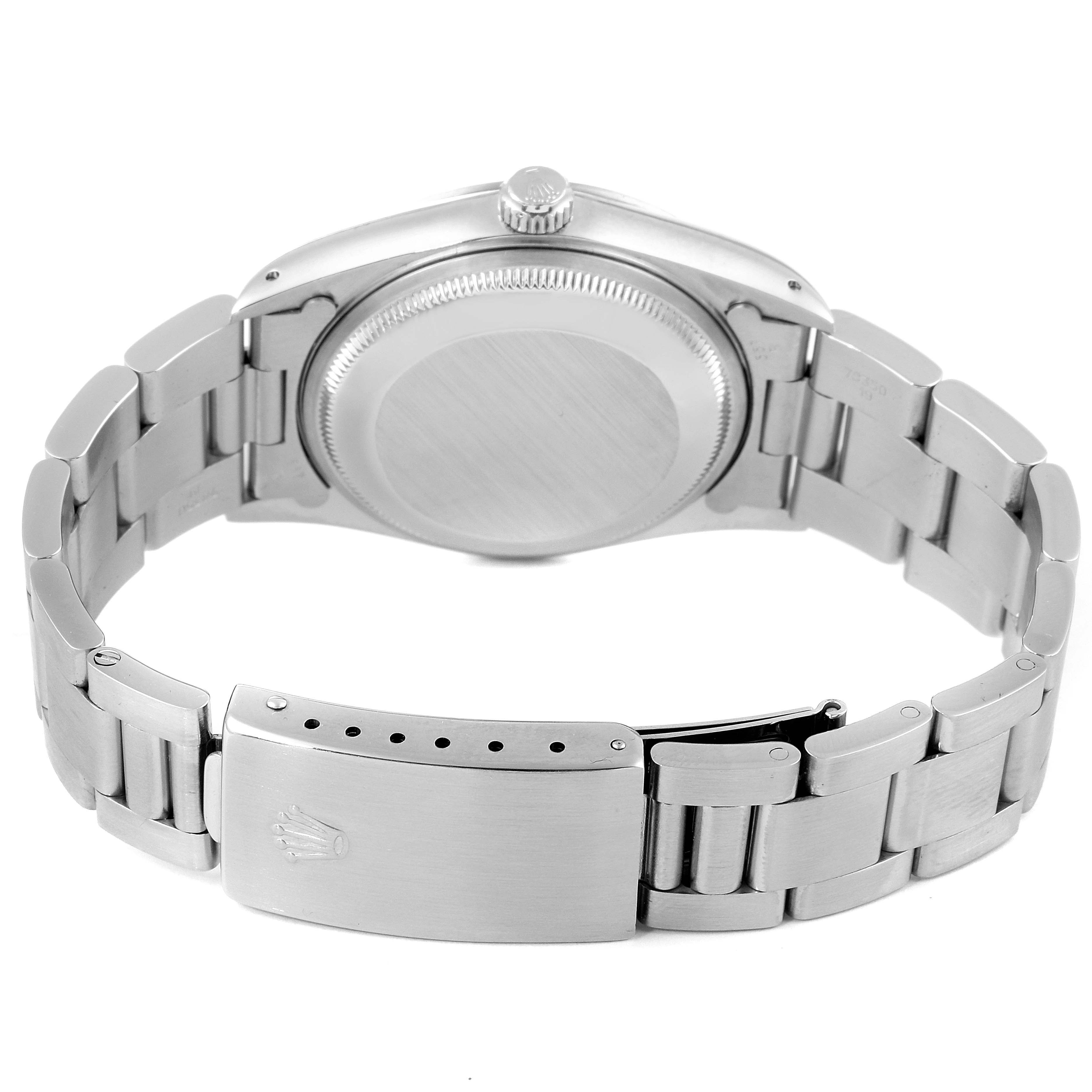 The image shows the back view of a Rolex Date 15200 Men's Stainless Steel Silver Dial 15200 Men's Stainless Steel Silver Dial model watch, focusing on the case back and the bracelet with the clasp.