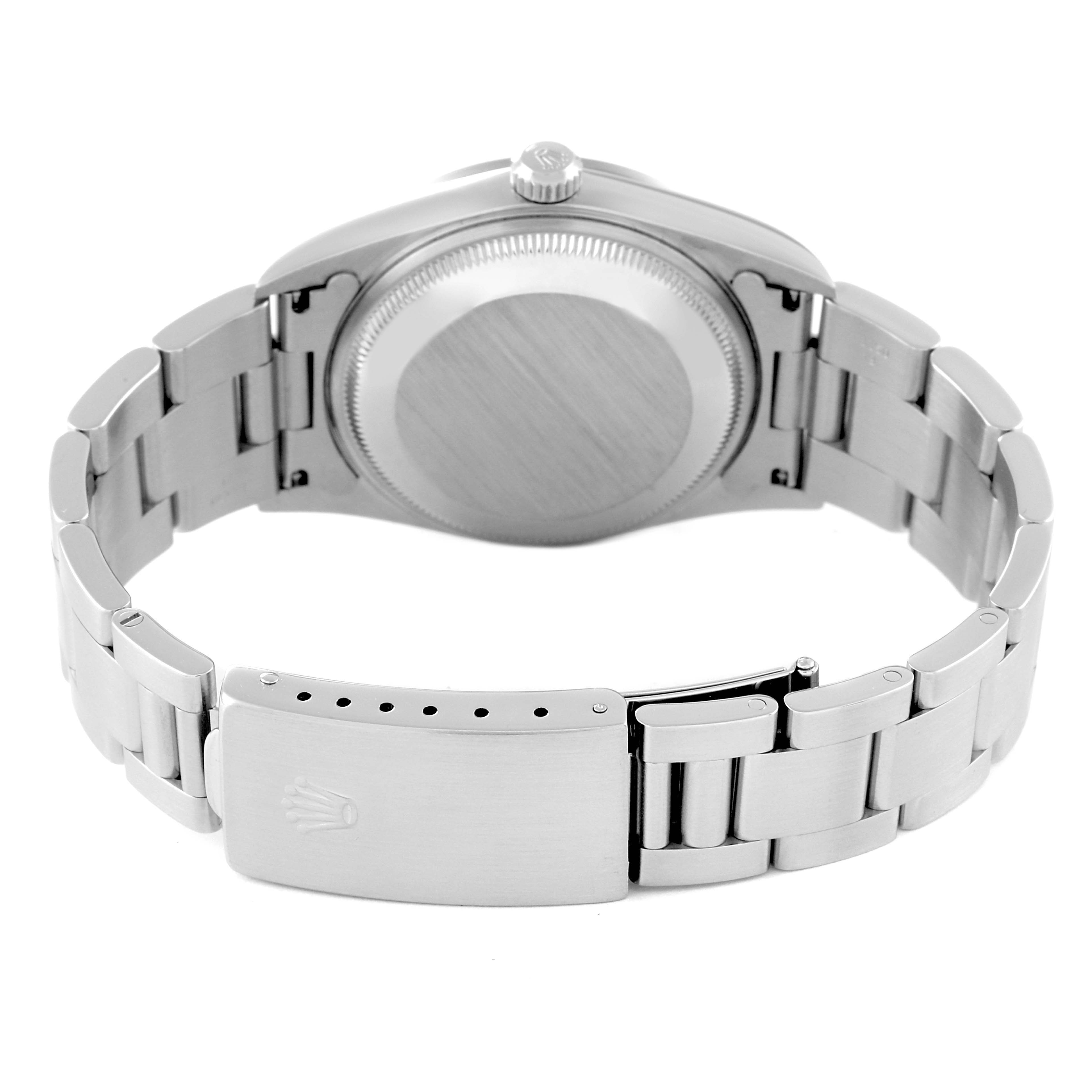 The image shows the back side of the Rolex Date 15200 Men's Stainless Steel Silver Dial 15200 Men's Stainless Steel Silver Dial model watch, focusing on the bracelet, clasp, and case back.