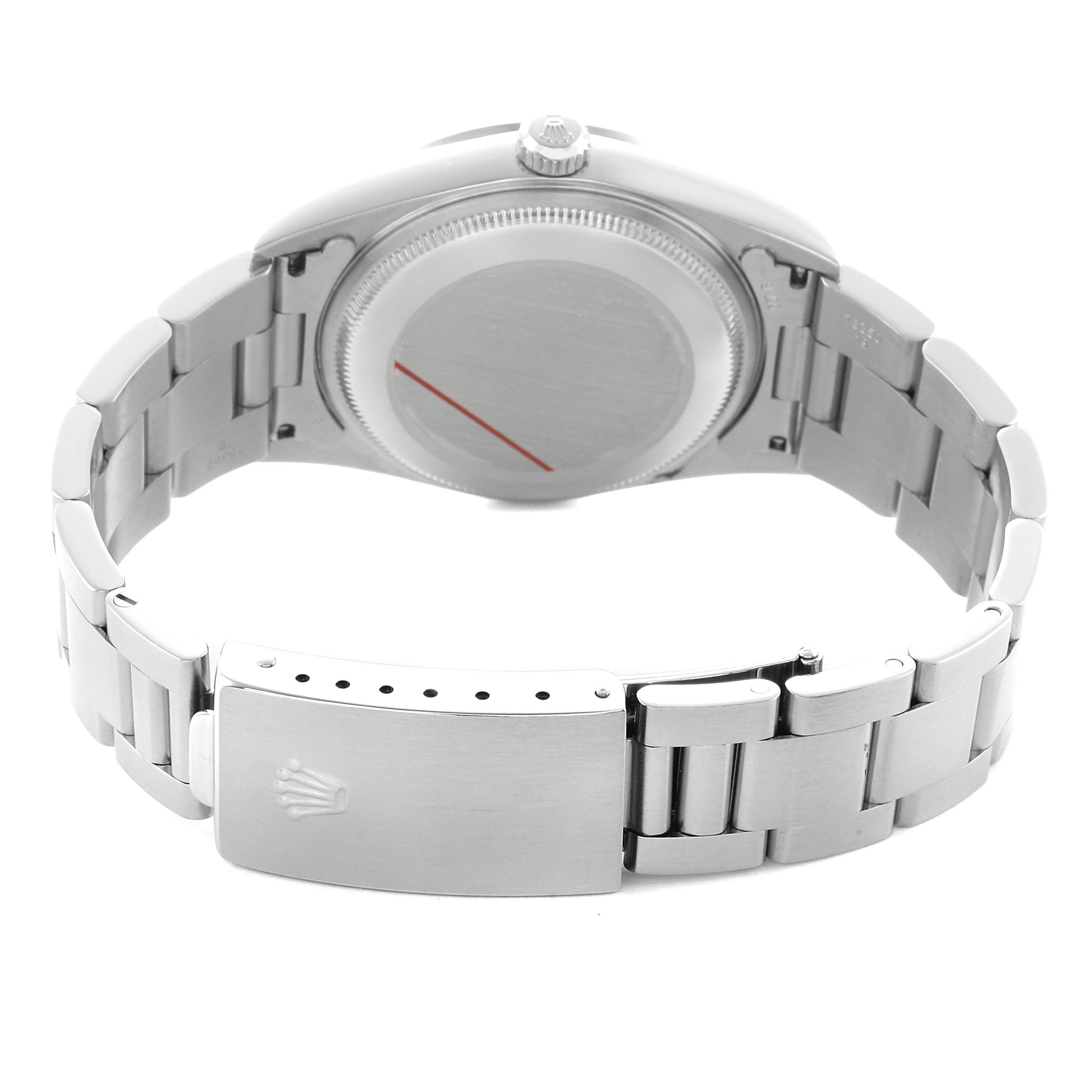 The image shows the back of a Rolex Date 15200 Men's Stainless Steel Silver Dial watch, featuring the clasp, case back, and bracelet from a rear angle.