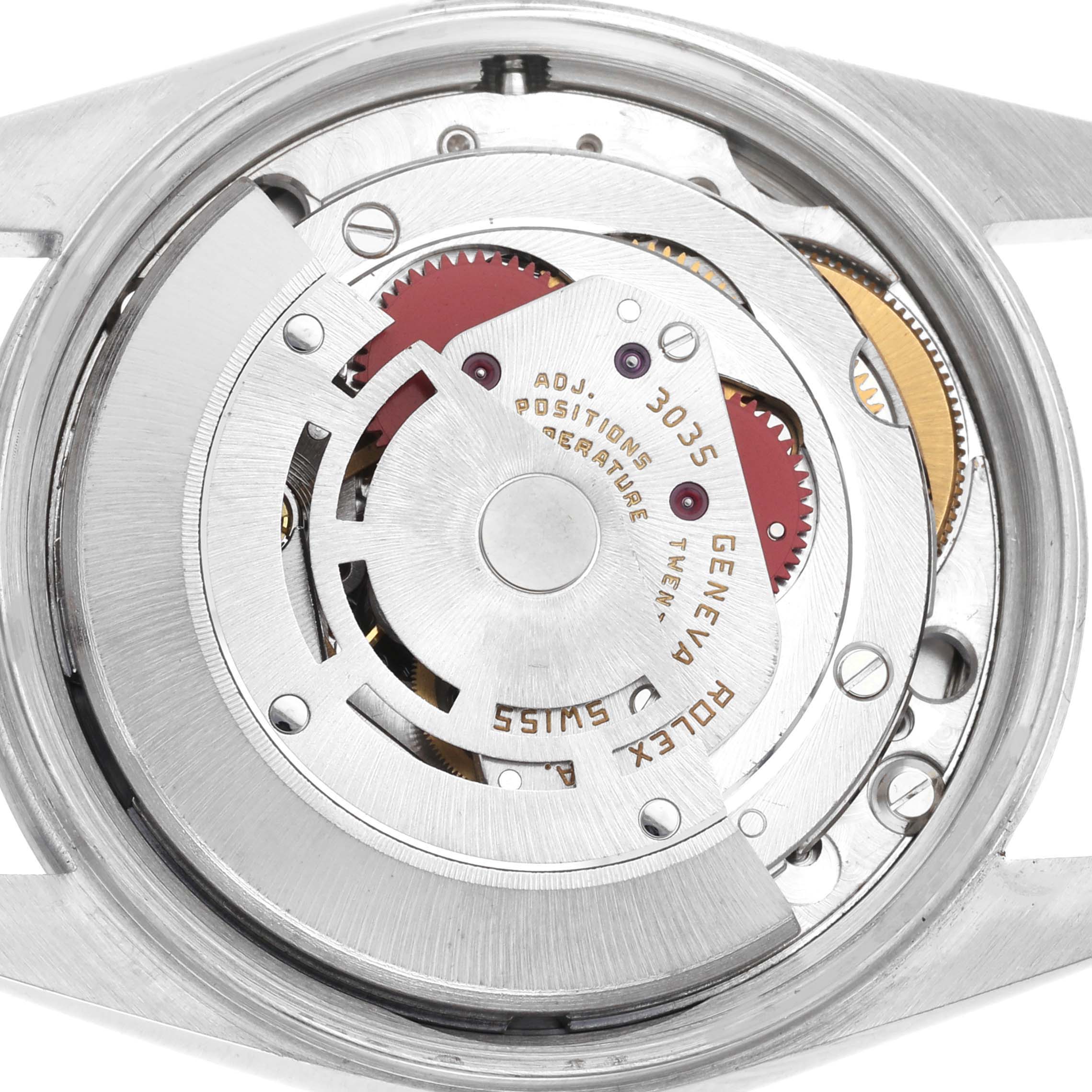 The image shows the movement of a Rolex Date 15000 Men's Stainless Steel Silver Dial 15000 Men's Stainless Steel Silver Dial model, revealing the intricate internal mechanics.