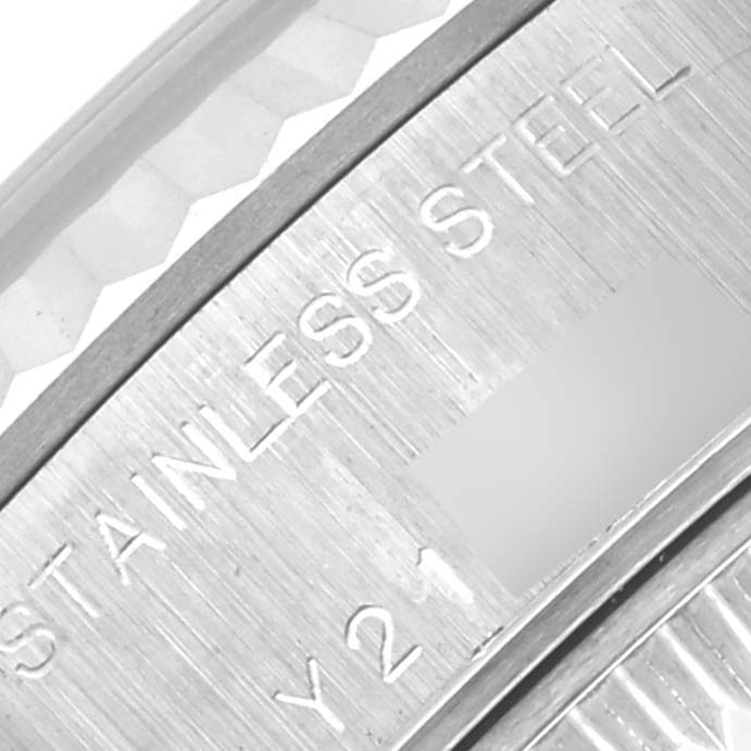 The image shows a close-up of the engraved stainless steel back of a Rolex Datejust 79174 Women's Stainless Steel Silver Dial 79174 Women's Stainless Steel Silver Dial watch.