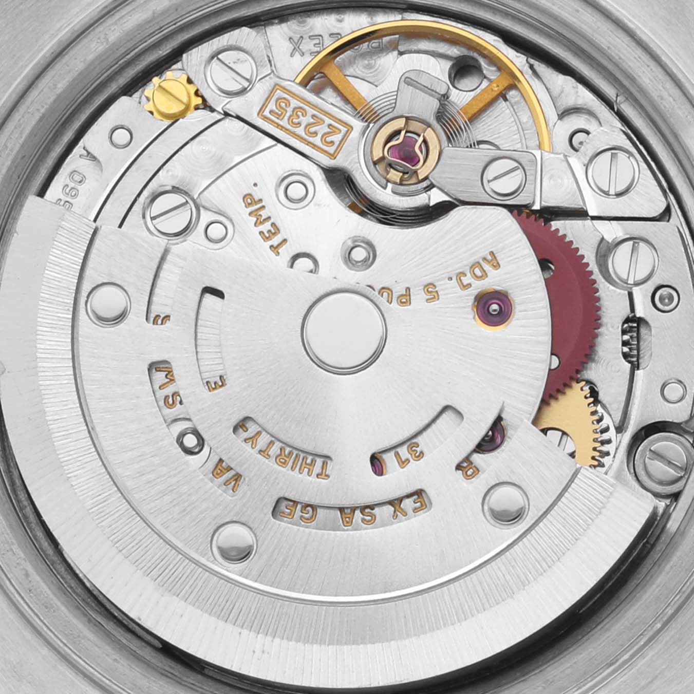 The image shows the movement of a Rolex Datejust 79174 Women's Stainless Steel Silver Dial 79174 Women's Stainless Steel Silver Dial, featuring intricate gears and components from a top-down angle.