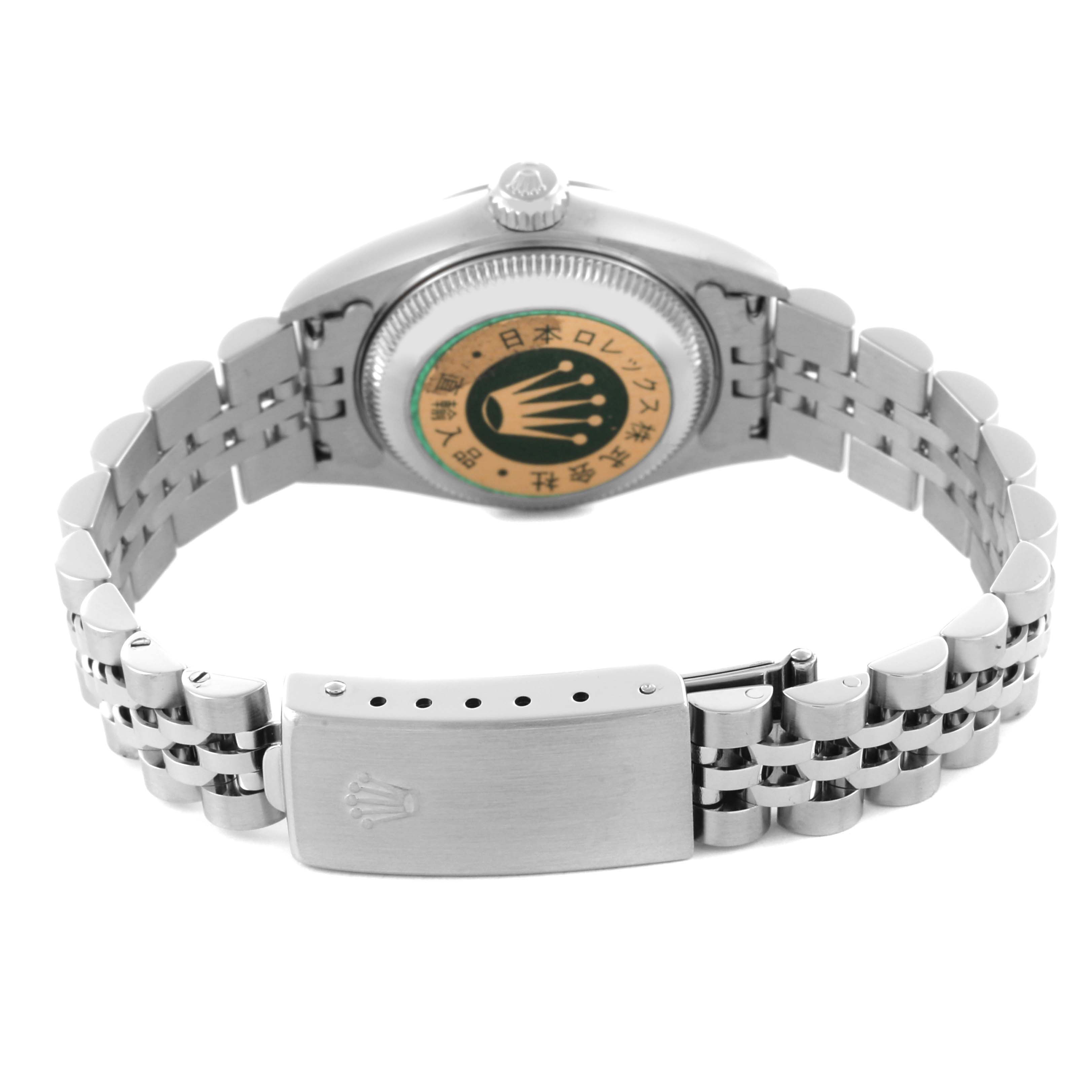 The Rolex Datejust 79174 Women's Stainless Steel Silver Dial 79174 Women's Stainless Steel Silver Dial watch is shown from the back, highlighting the caseback, crown, and bracelet.