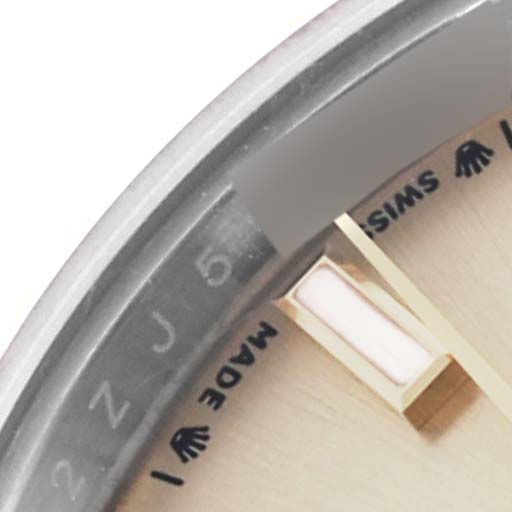 The image shows a close-up of the dial edge and markings on a Rolex Datejust 279173 Women's Steel and Gold (two tone) Champagne Dial 279173 Women's Steel and Gold (two tone) Champagne Dial watch.