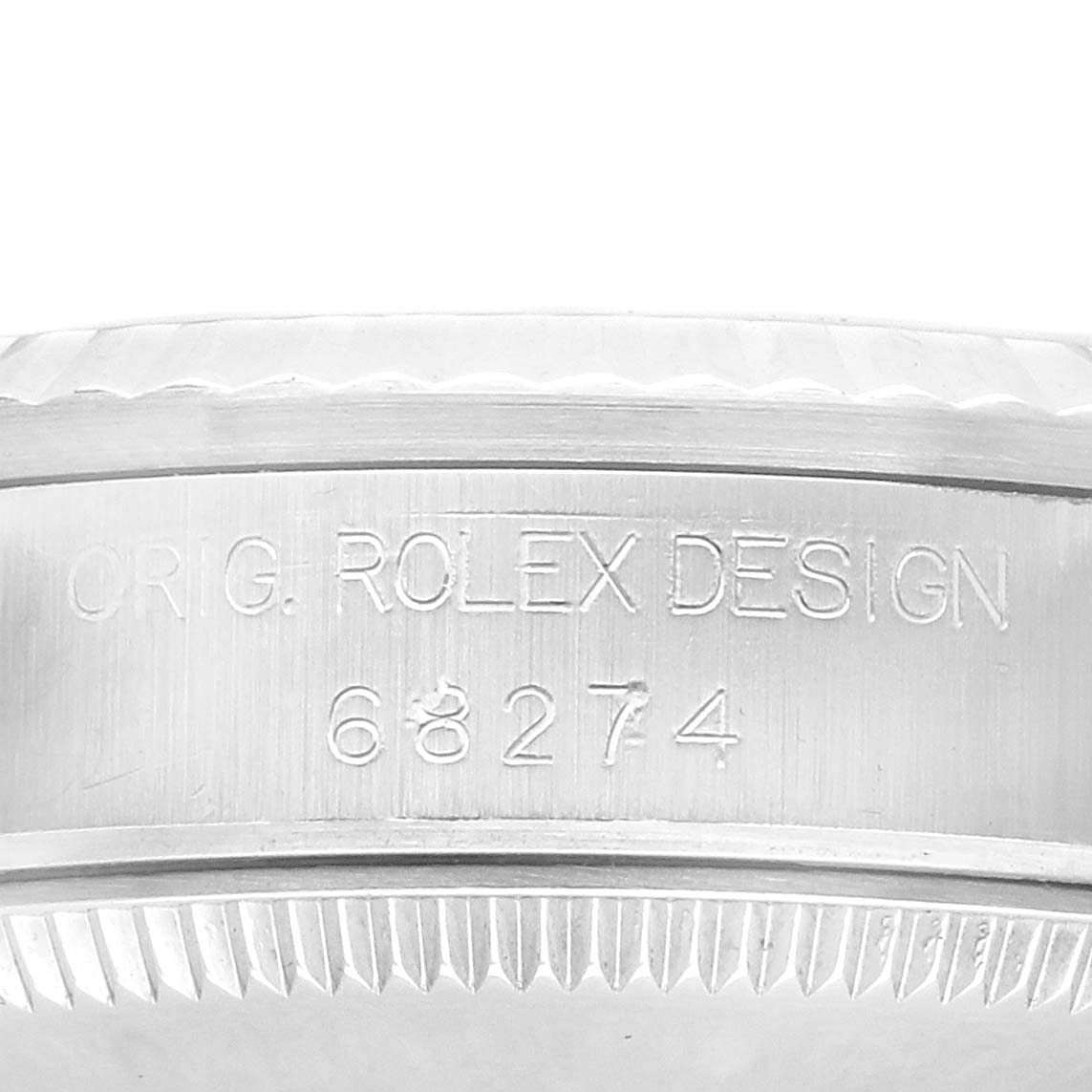 The image shows a close-up of the engraved side casing of a Rolex Datejust 68274 Women's Stainless Steel Silver Dial, highlighting the "ORIG. ROLEX DESIGN" text and model number.
