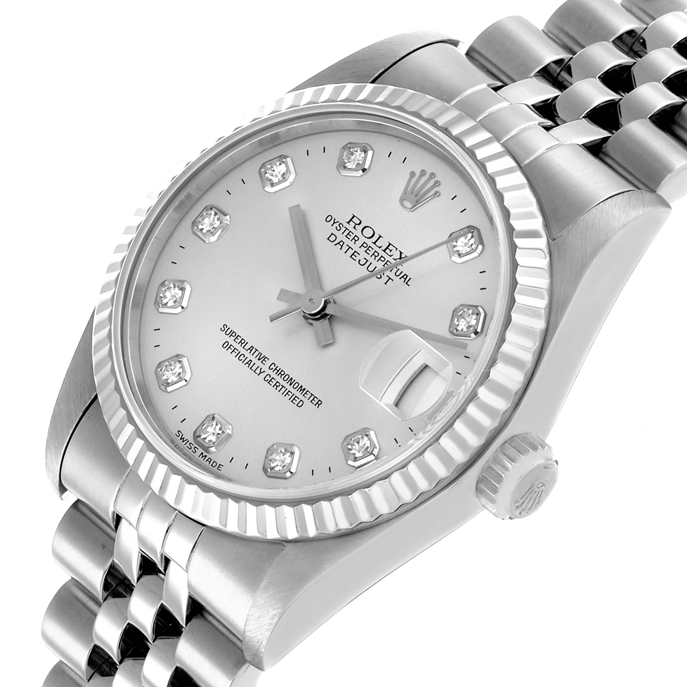 The Rolex Datejust 68274 Women's Stainless Steel Silver Dial watch is shown at a tilted angle, highlighting the face, crown, bezel, and part of the bracelet.