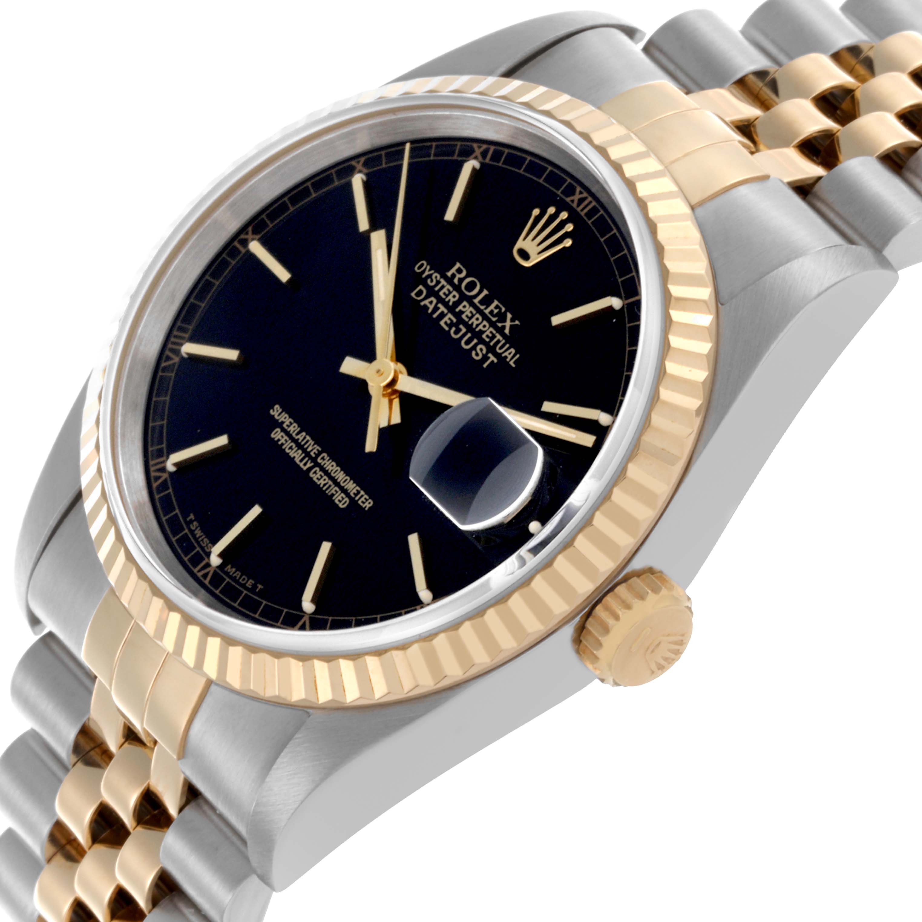 The Rolex Datejust 16233 Men's Steel and Gold (two tone) Black Dial 16233 Men's Steel and Gold (two tone) Black Dial is shown at a slight angled view, highlighting its black dial, fluted bezel, and jubilee bracelet.