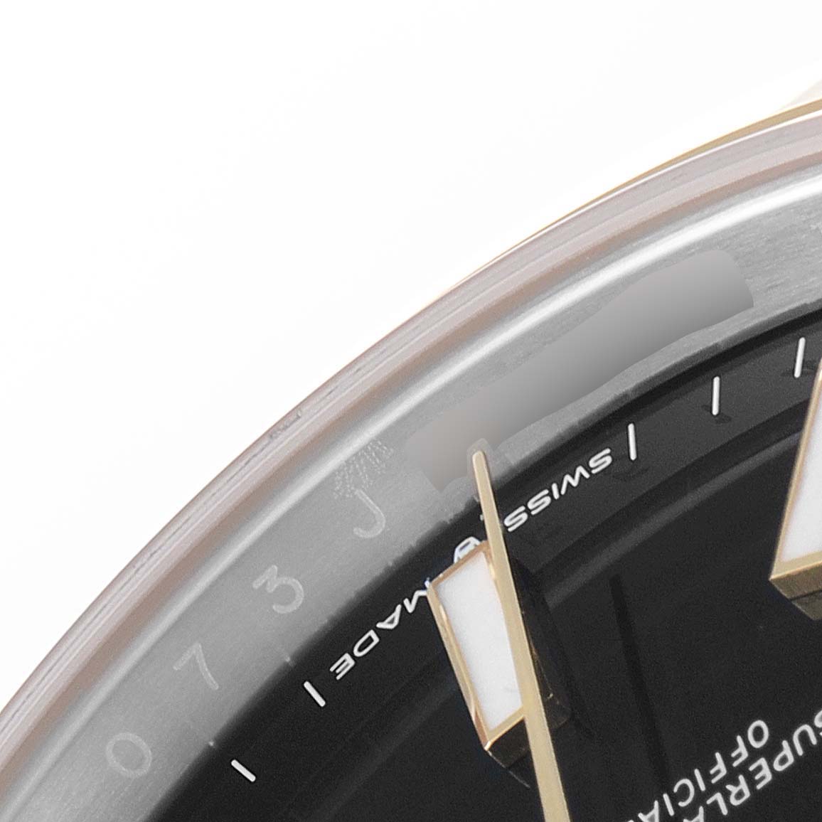 The image shows a close-up of the dial and hands of a Rolex Datejust 41 126303 Men's Steel and Gold (two tone) Black Dial 126303 Men's Steel and Gold (two tone) Black Dial watch.