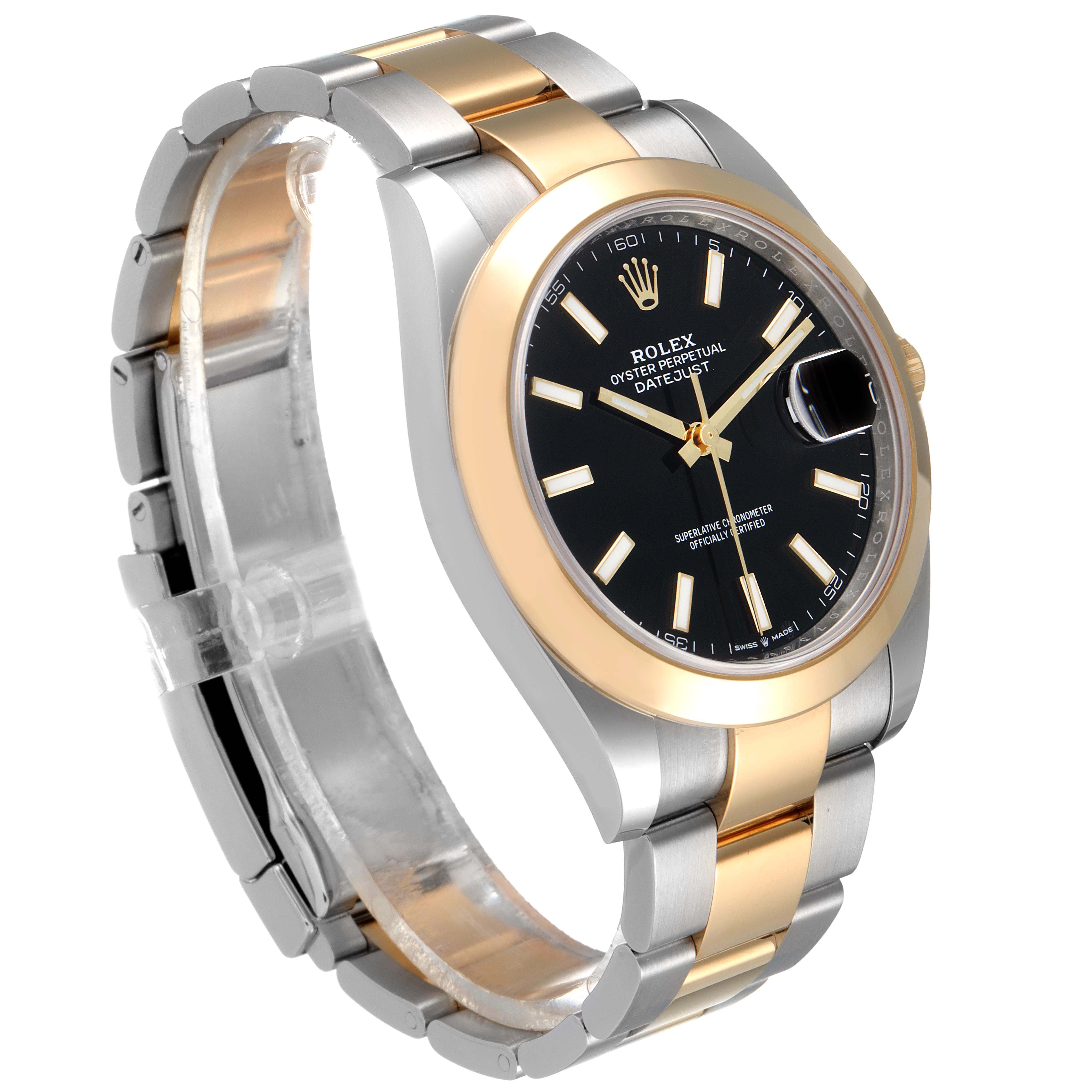 The image shows a side angle of a Rolex Datejust 41 126303 Men's Steel and Gold (two tone) Black Dial 126303 Men's Steel and Gold (two tone) Black Dial watch, highlighting its two-tone bracelet and black dial.