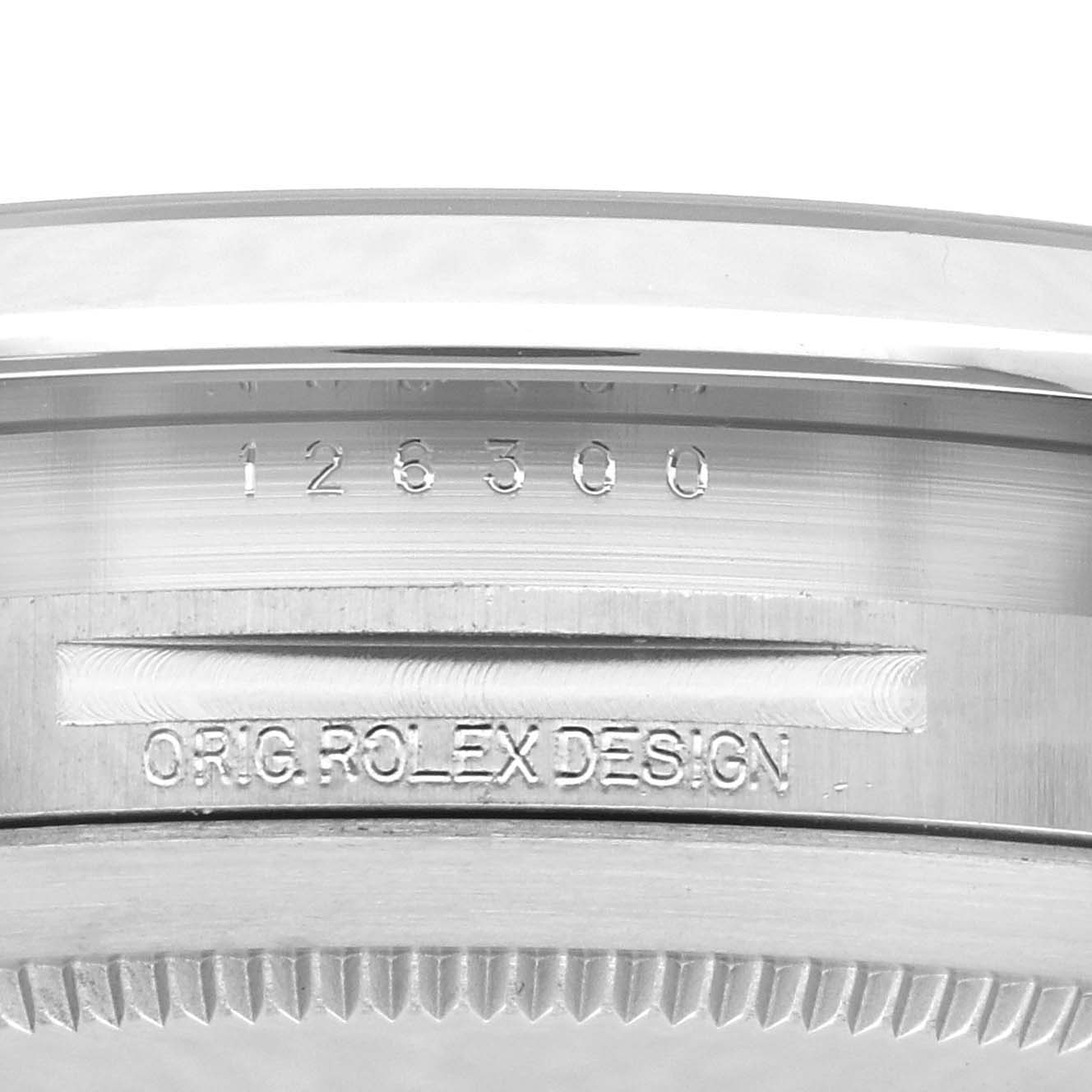 The image shows the side engraving on the case of a Rolex Datejust 41 126300 Men's Stainless Steel White Dial 126300 Men's Stainless Steel White Dial, including the model number and "O.R.G. ROLEX DESIGN."