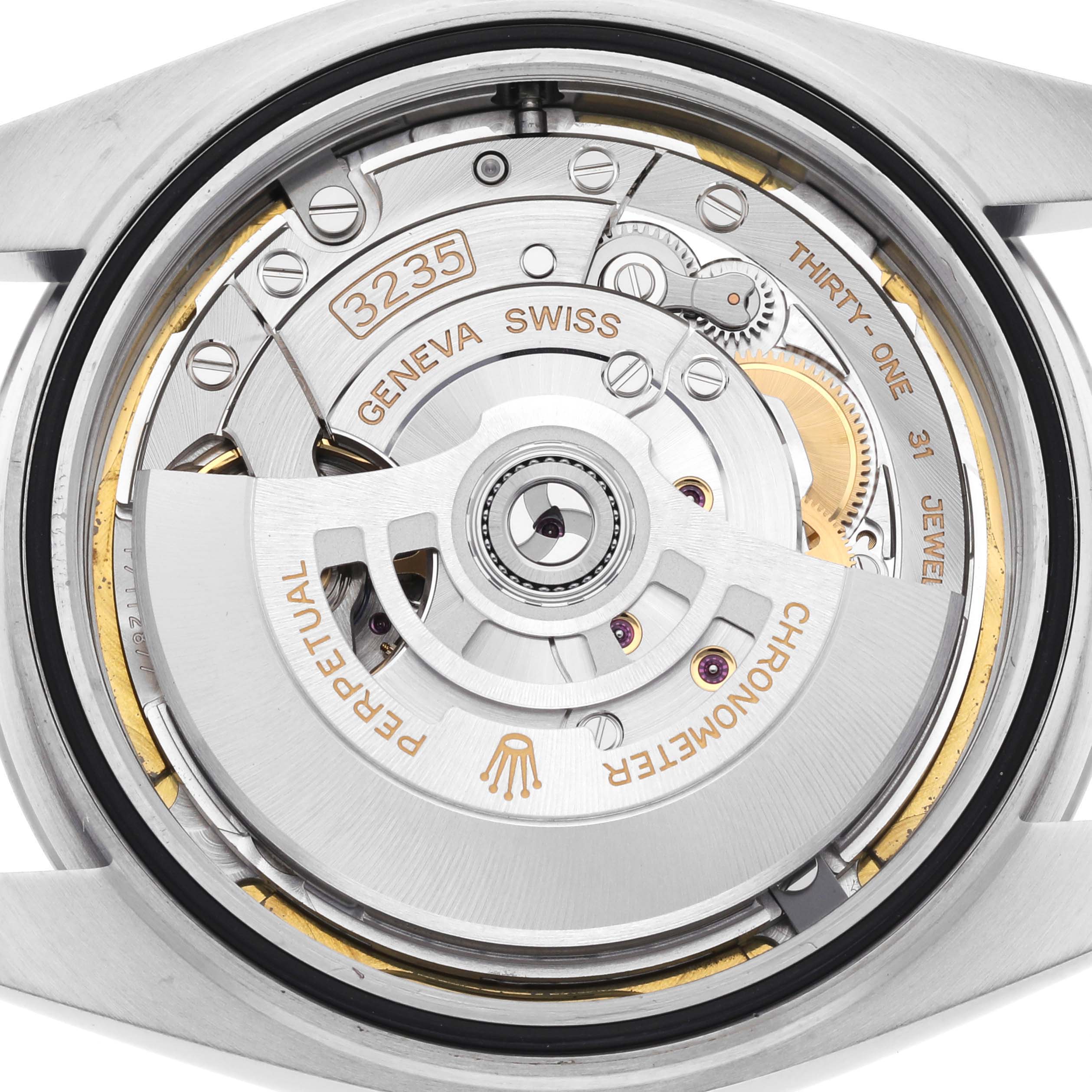 This image shows the movement and back view of the Rolex Datejust 41 126300 Men's Stainless Steel White Dial 126300 Men's Stainless Steel White Dial, highlighting the intricate internal mechanism.