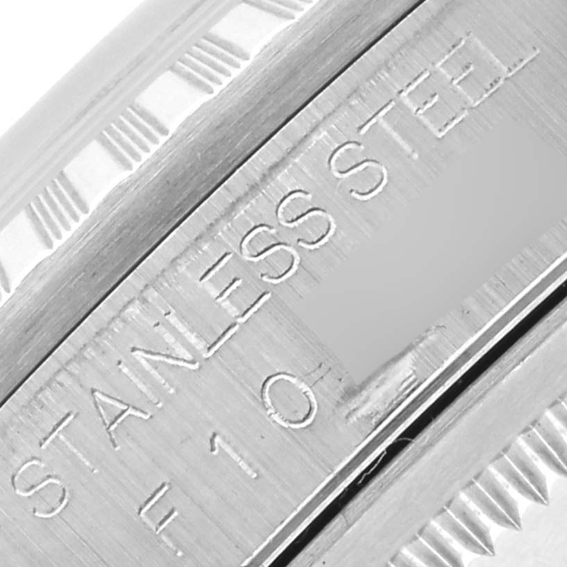 The image shows a close-up of the side of a Rolex Datejust 16220 Men's Stainless Steel Silver Dial 16220 Men's Stainless Steel Silver Dial, highlighting the stainless steel engraving.